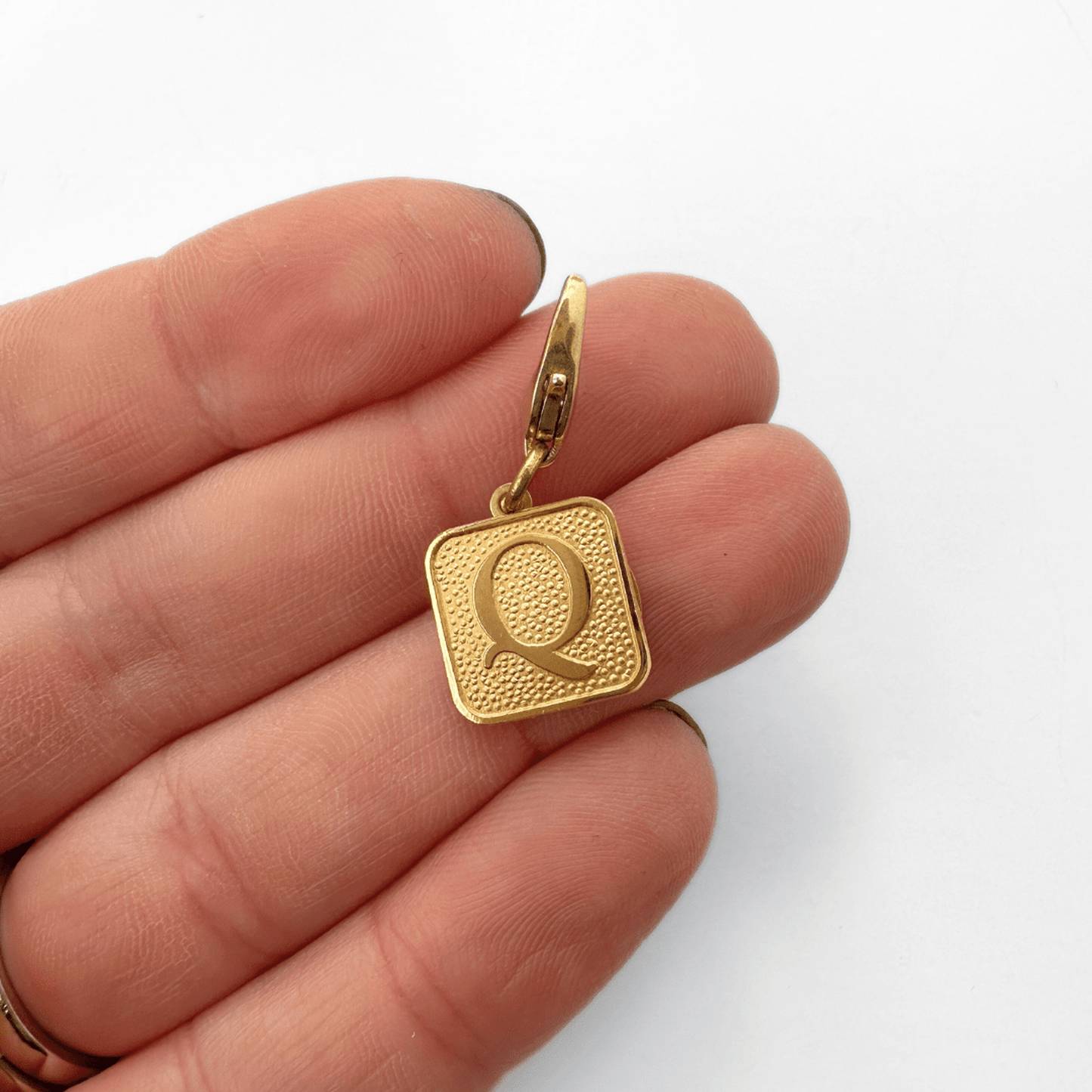 Small vintage gold square Q monogram charm with lobster claw clasp