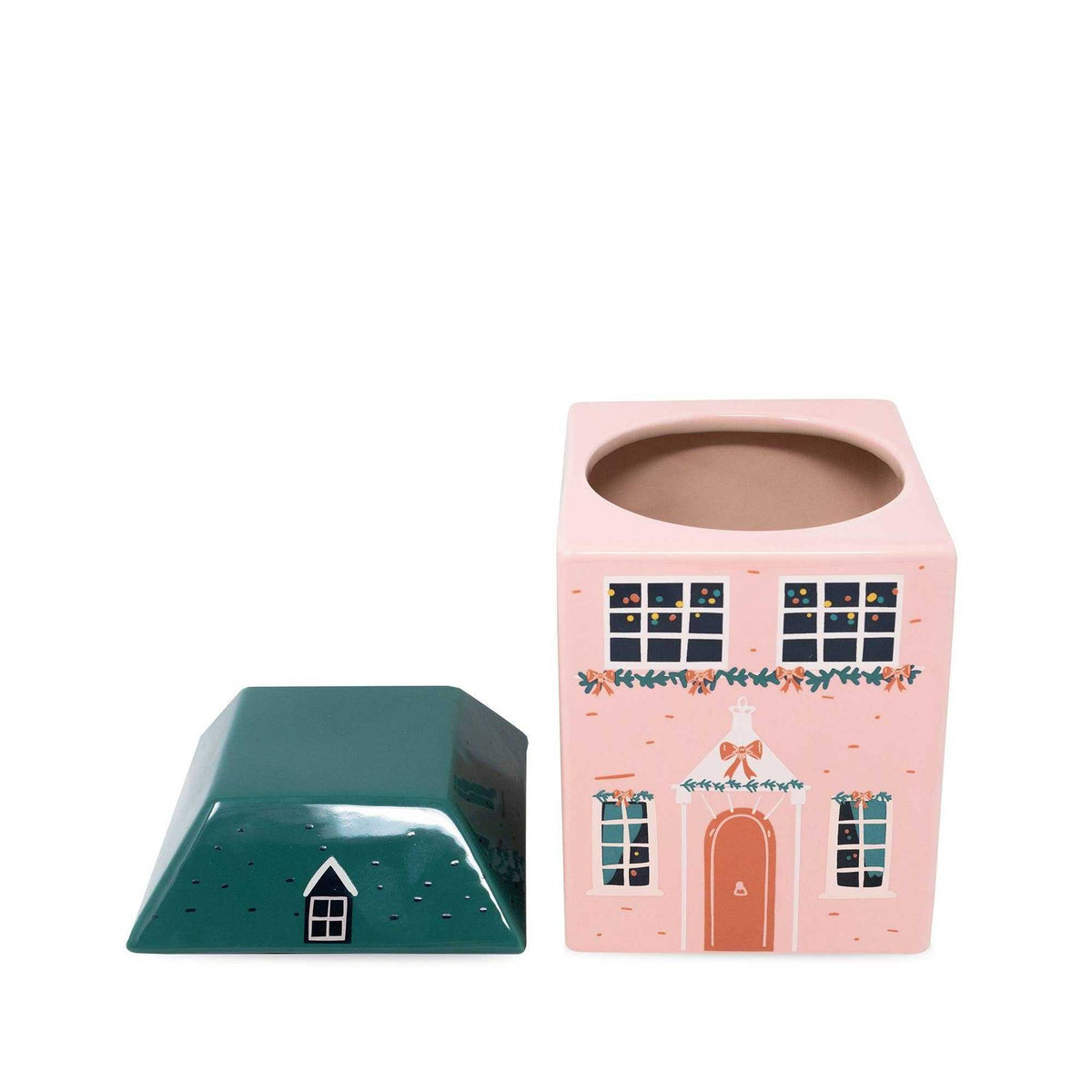 
                  
                    Ceramic holiday cookie jar shaped like a pink cottage with removable green roof lid
                  
                