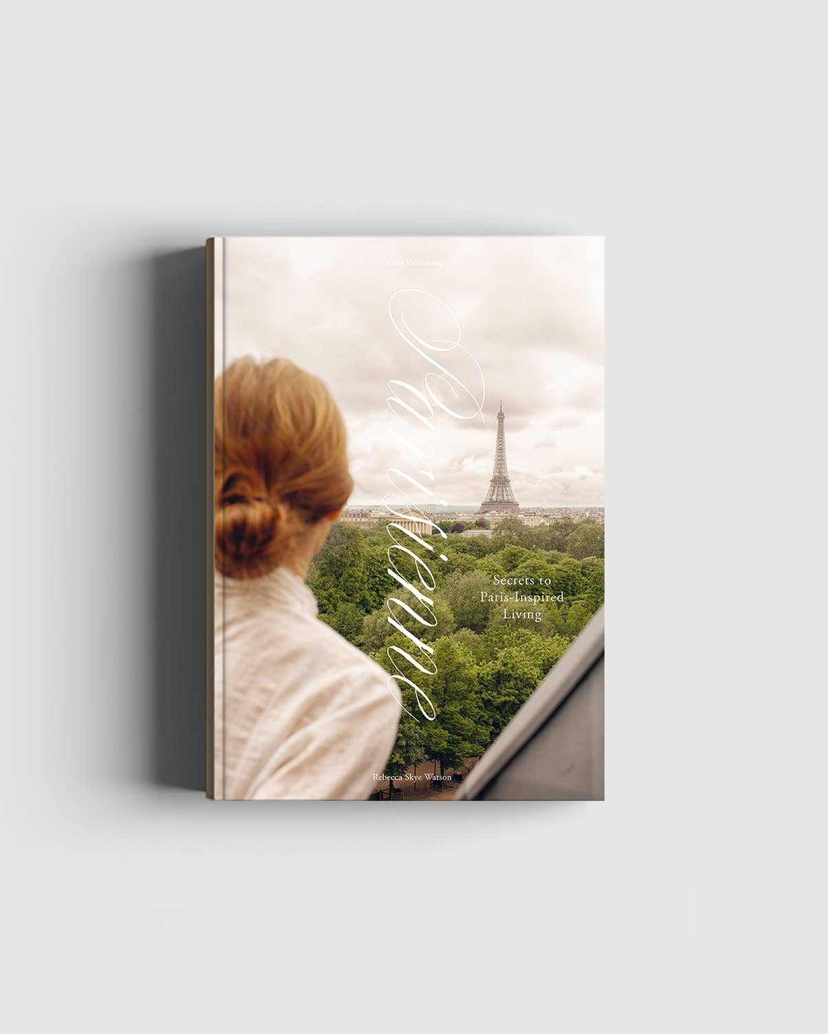 Parisienne – Secrets book cover with woman looking at Eiffel Tower and Parisian landscape