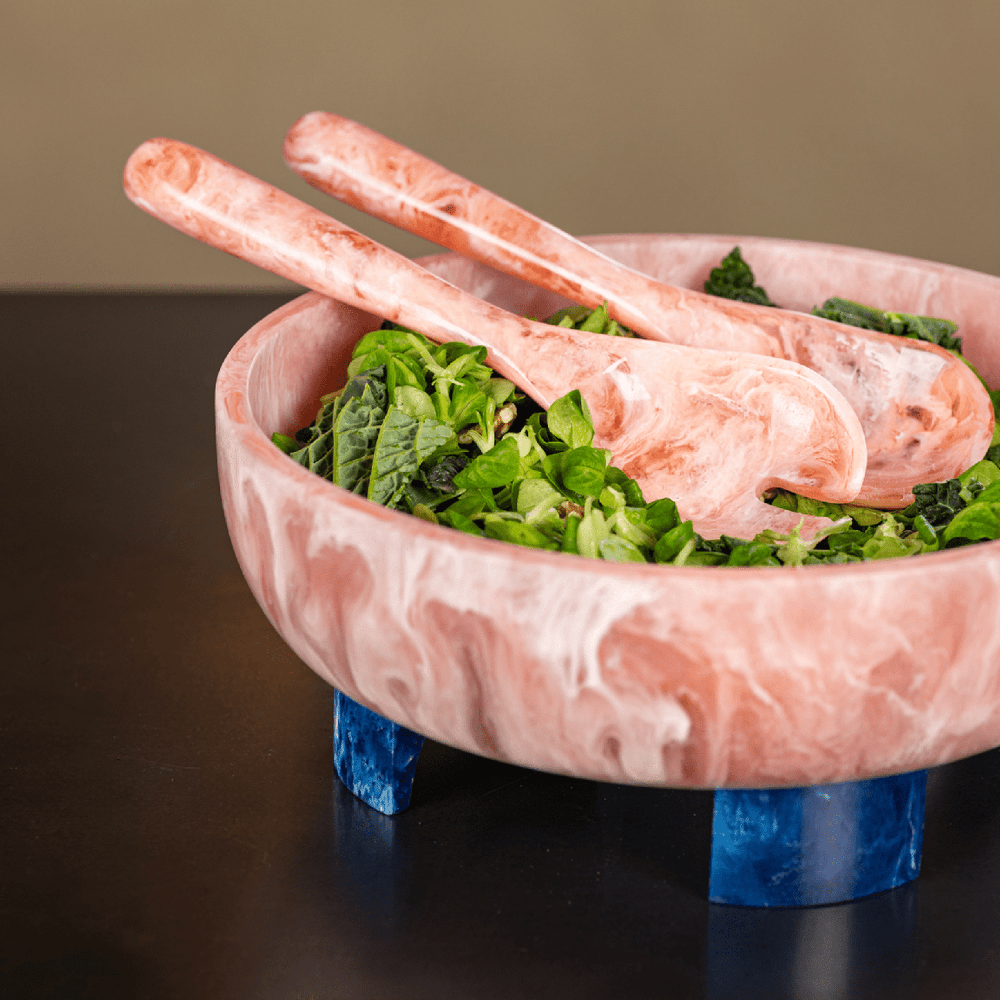 Handmade Pavone salad servers with bold swirl pattern and vibrant translucent colors, luxury serving spoon and fork set