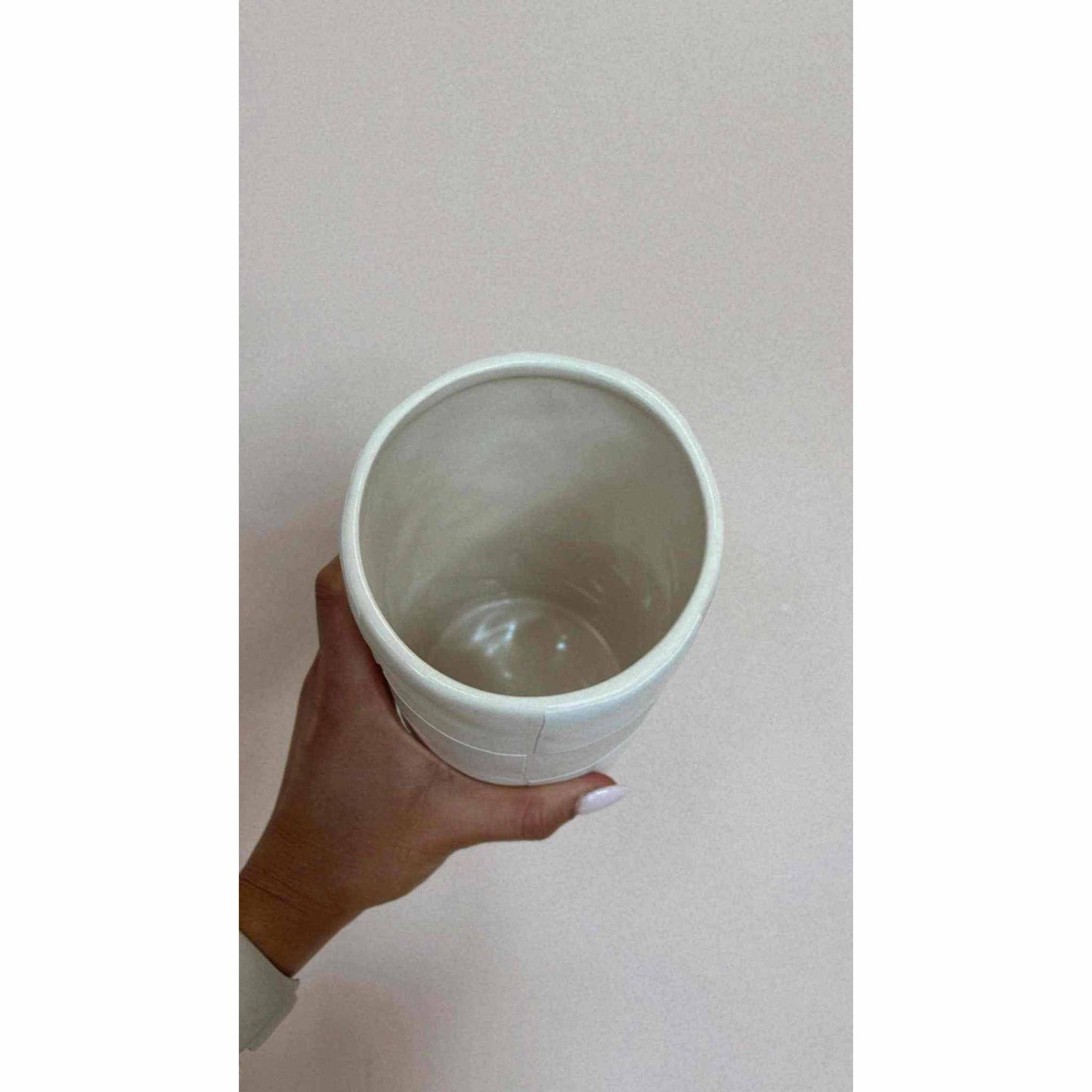 Checkmate Ceramic Vase textured white and cream ceramic flower vase held in hand, 3.5x7.5 inches, elegant and versatile for indoor and outdoor decor.