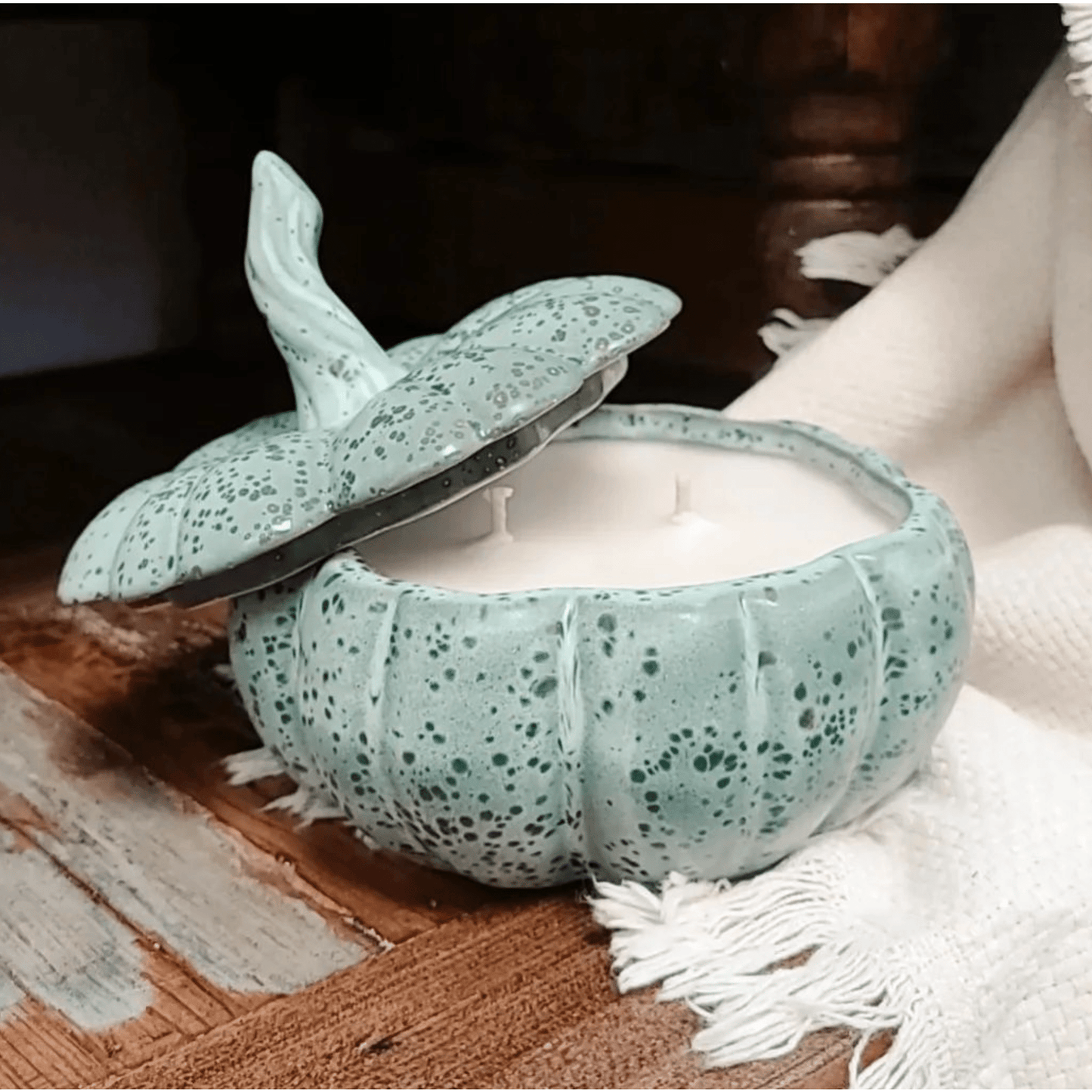 Fall scented ceramic pumpkin soy candle with lid in green speckled design and Apple Maple Bourbon scent