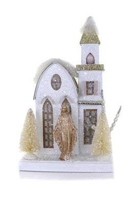 Petite white church decoration with golden accents and snowy trees