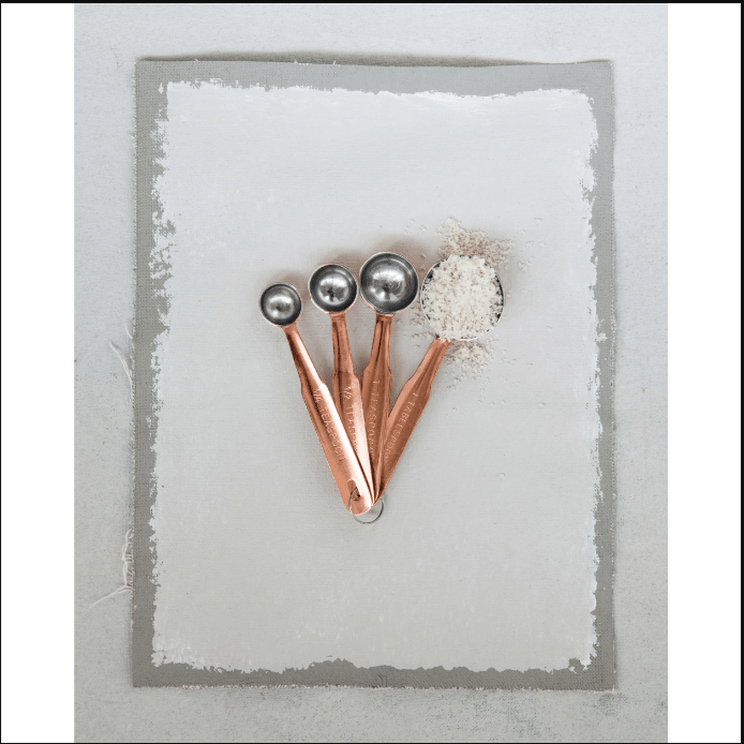 Copper finished stainless steel measuring spoons set of 4 with 1/4, 1/2, 1 tsp and 1 tbsp sizes