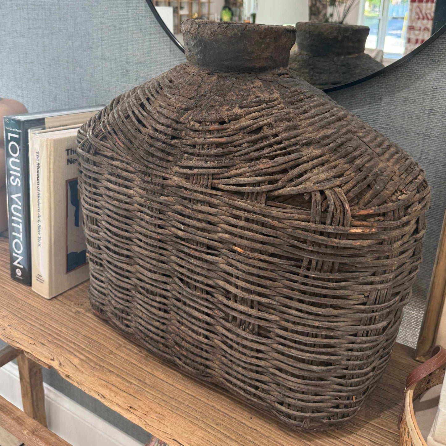 Antique Chinese woven willow oil container basket with intricate design and vintage charm