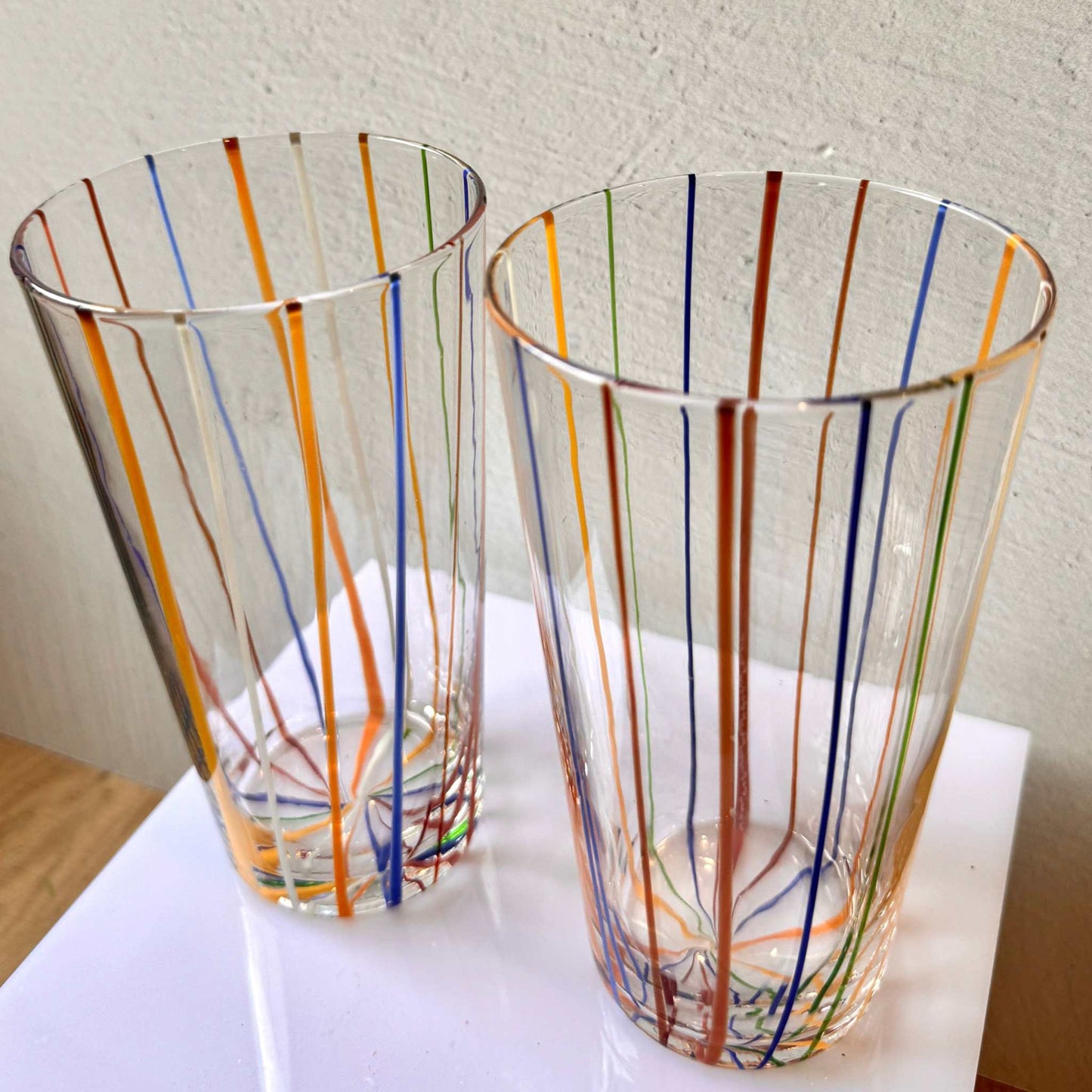 
                  
                    Set of 4 Vintage Murano Style Italian glassware with colorful vertical stripes, 2 short and 2 tall glasses
                  
                