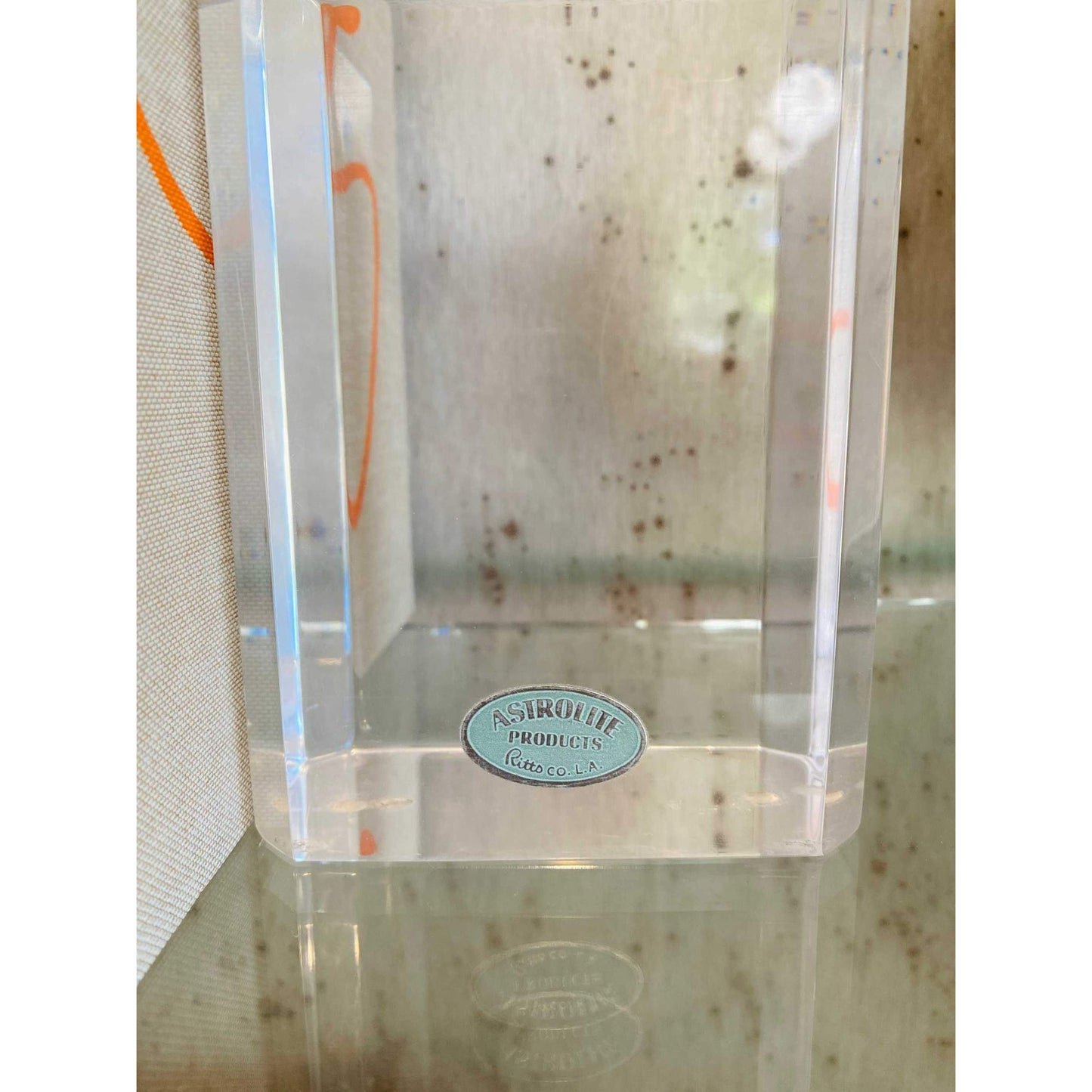 
                  
                    Astrolite beveled lucite bookends with faceted clear thick design by Ritts
                  
                