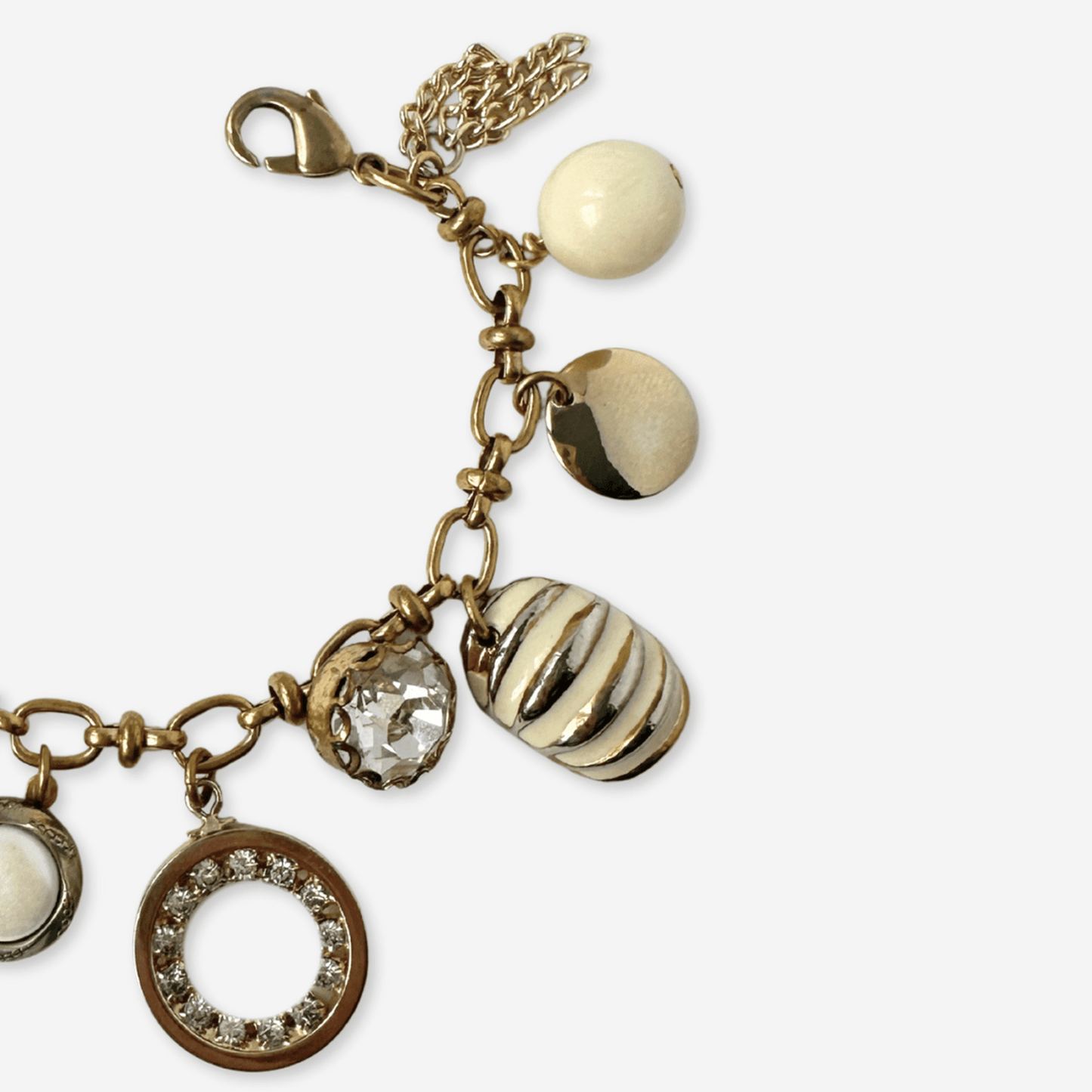 
                  
                    Repurposed vintage cream and gold mixed charm bracelet - Curated Home Decor
                  
                