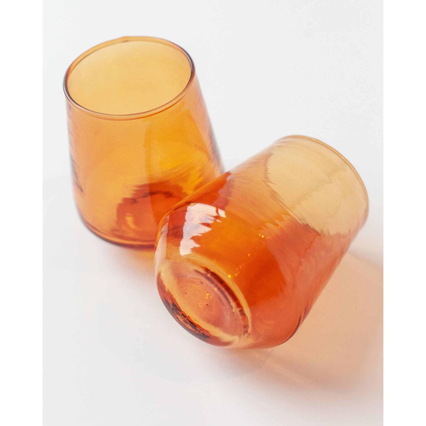 
                  
                    A pair of amber handblown hammered glass water tumblers. - Curated Home Decor
                  
                