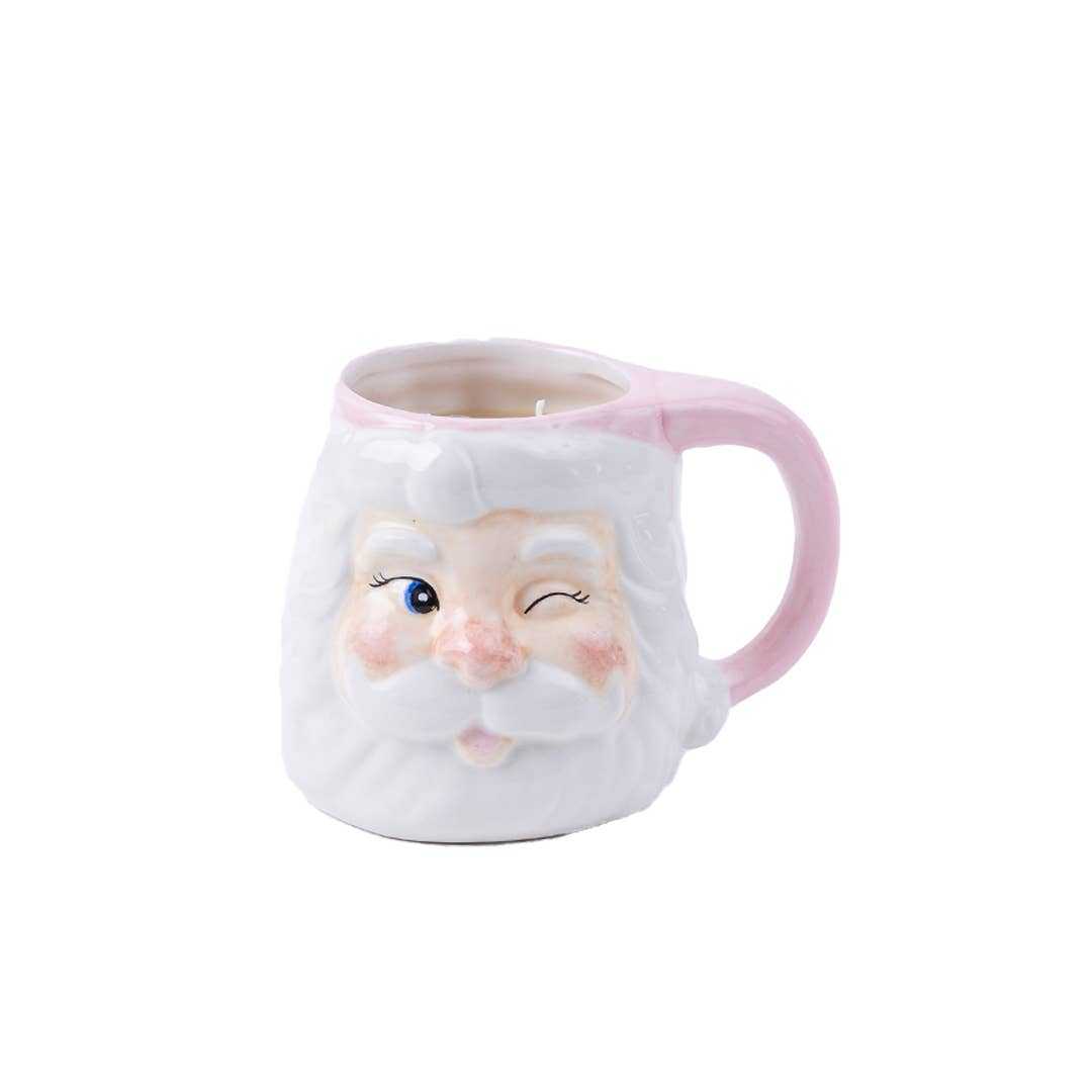 Sweet Grace Santa Mug candle with pink handle and winking Santa face design