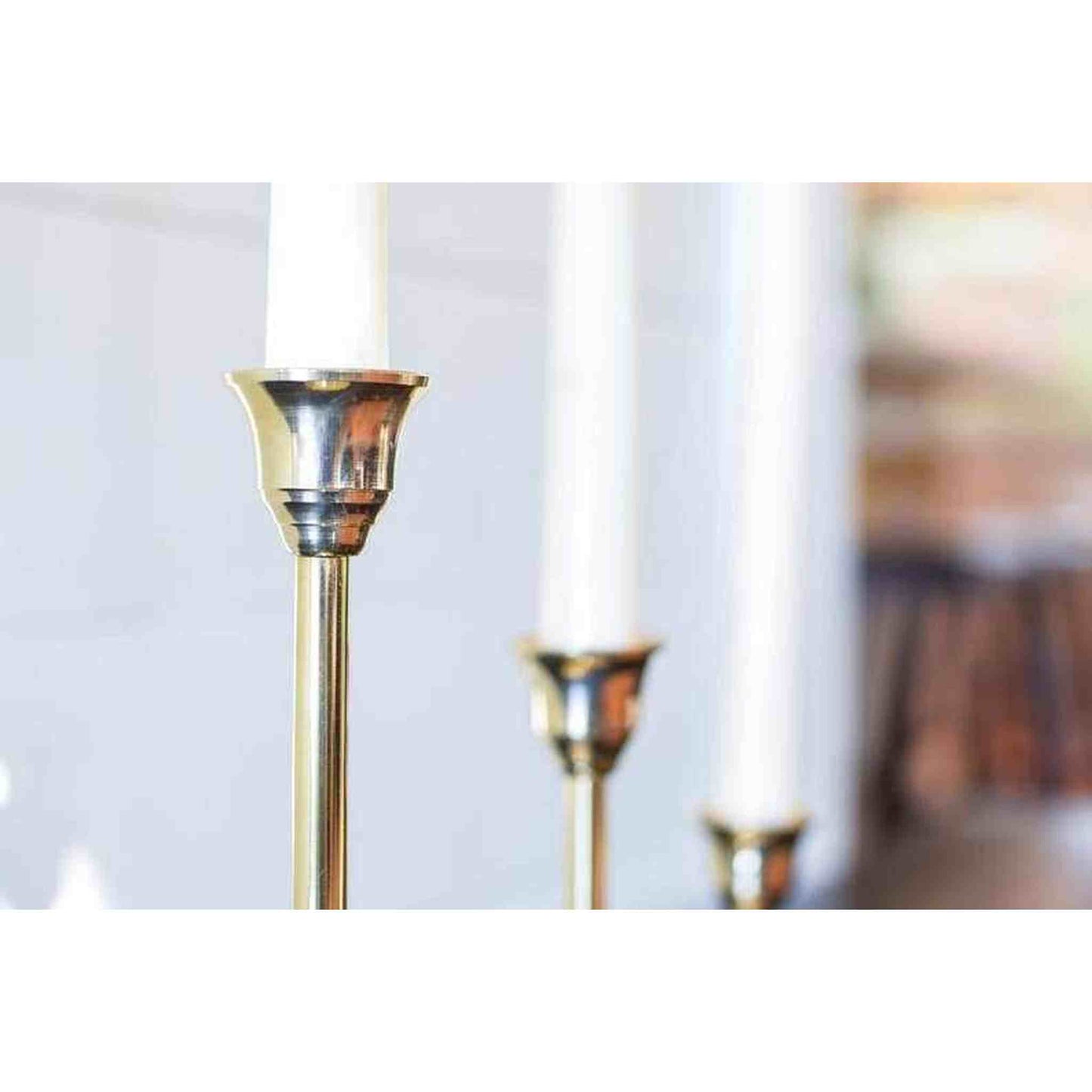 
                  
                    A set of three brass candlesticks. - Curated Home Decor
                  
                