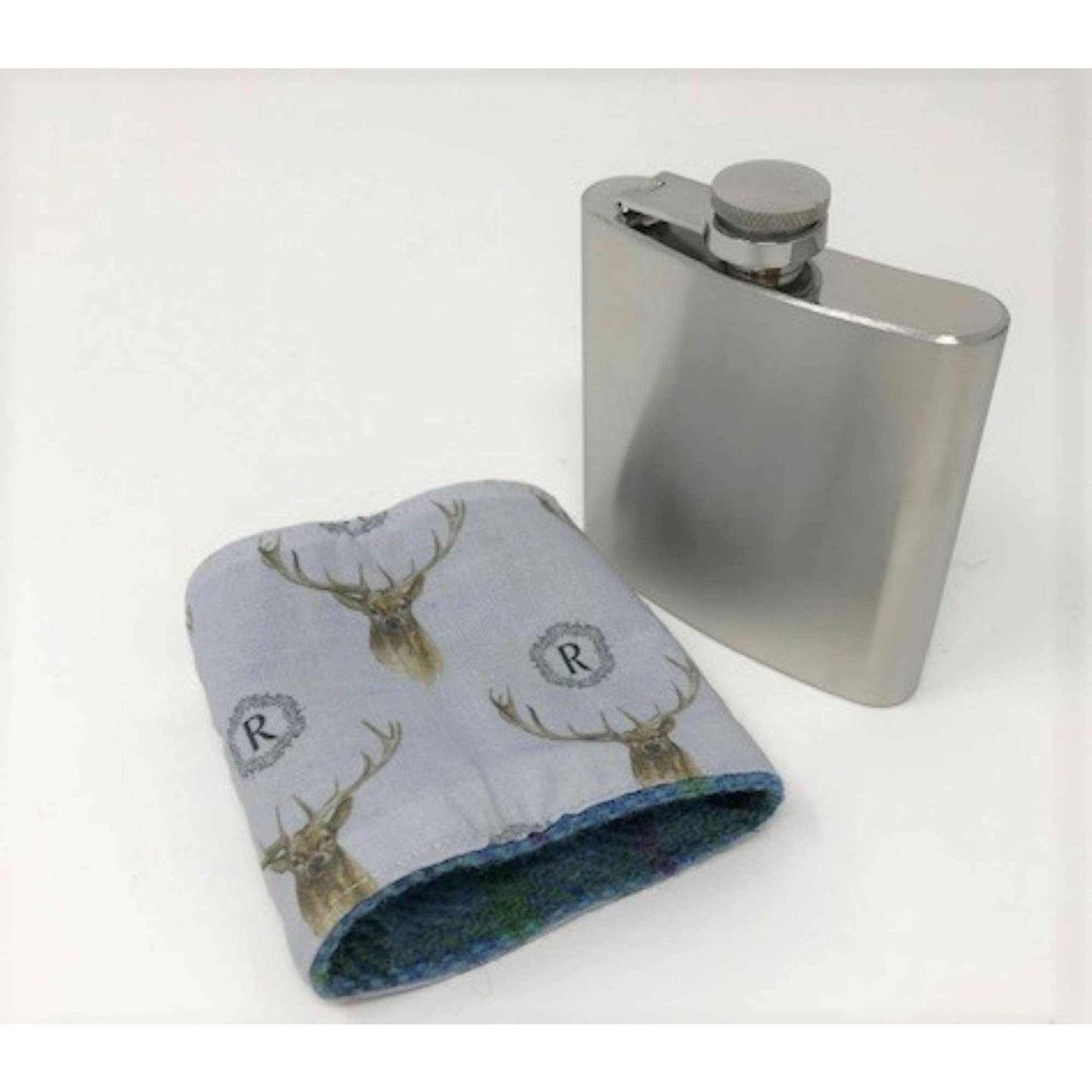 6oz stainless steel Harris Tweed hip flask with removable stag-patterned cloth sleeve and Blackwatch tartan lining