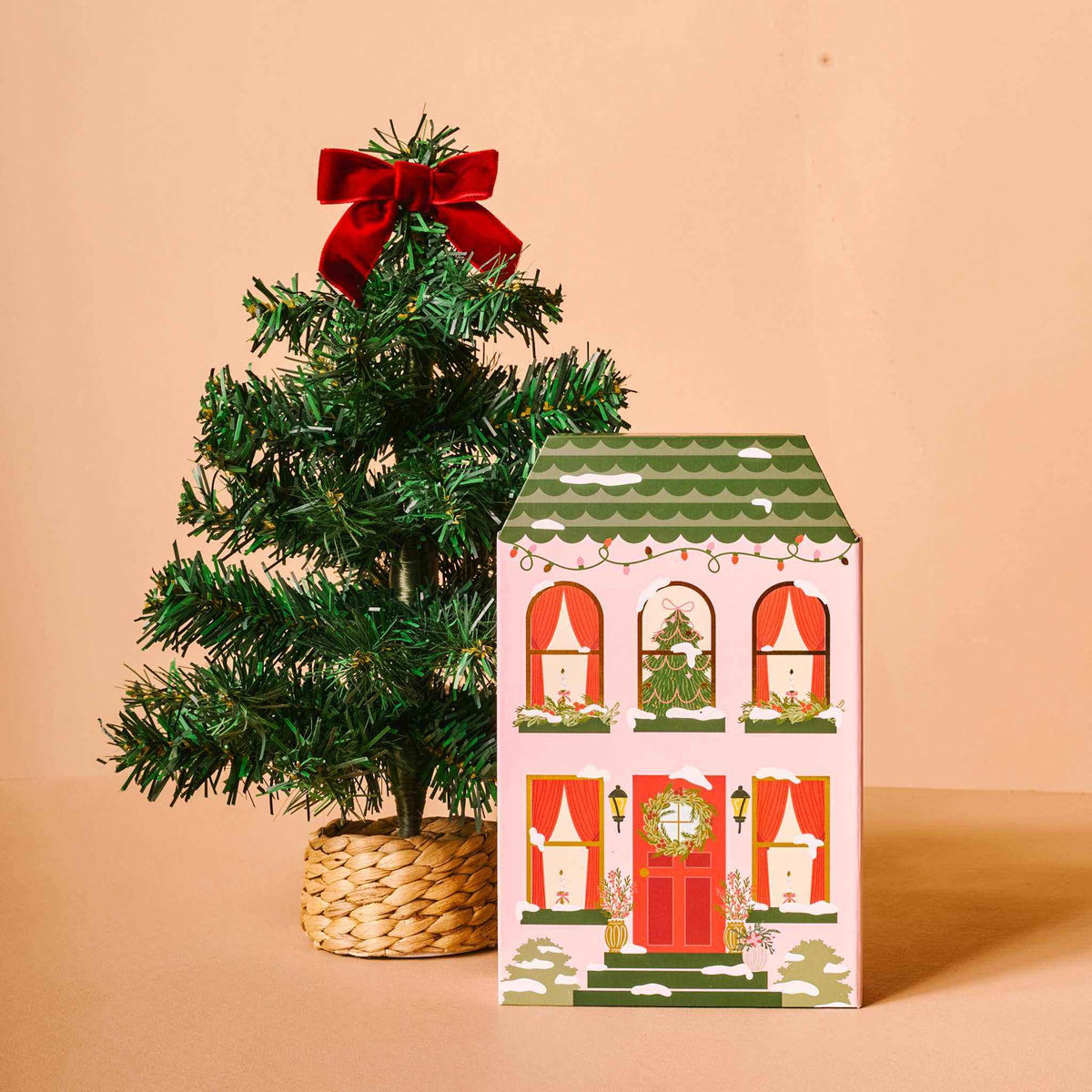 
                  
                    Advent Village House with mini artificial Christmas tree and red bow Holiday ornament set
                  
                