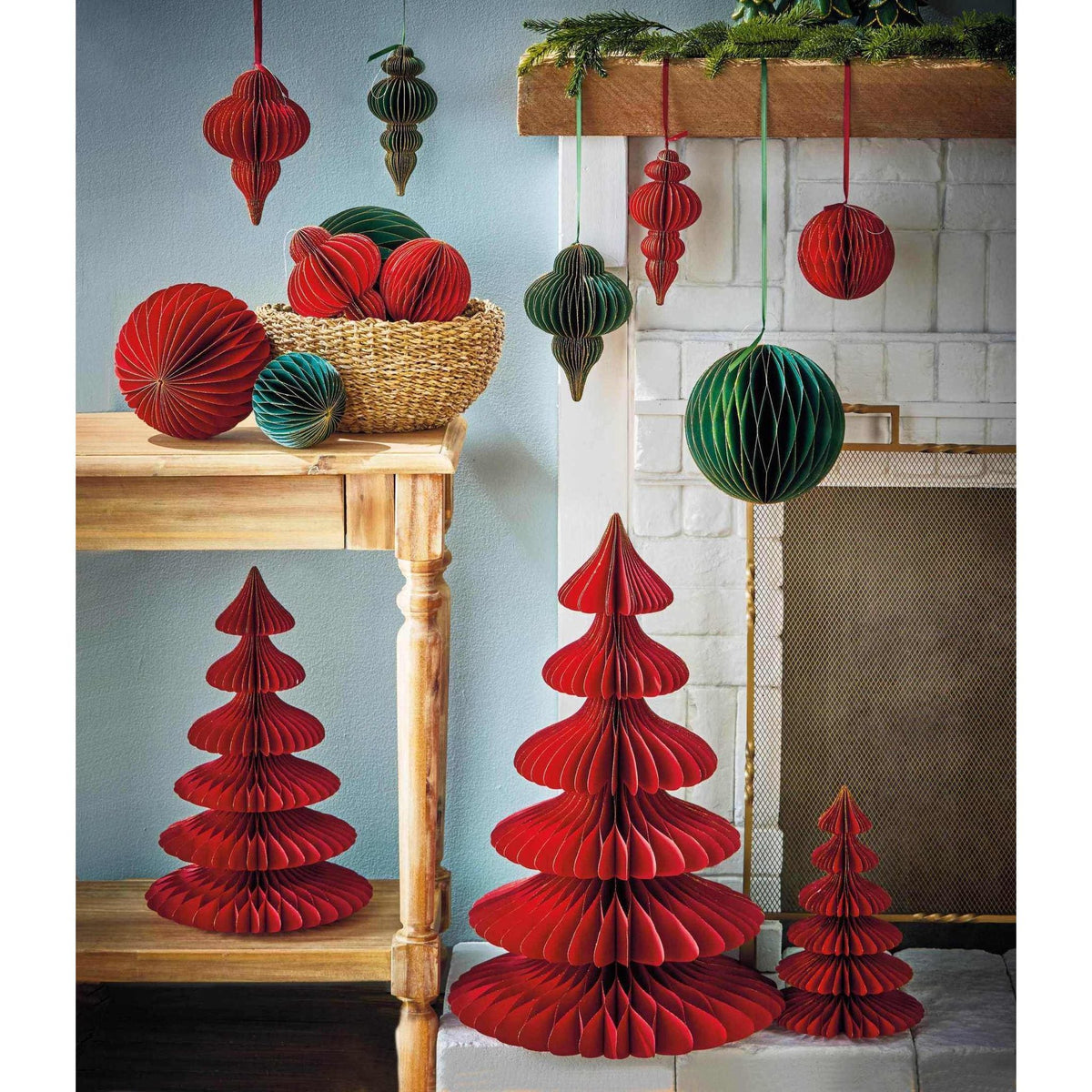 
                  
                    Christmas Glimmer Paper Tree Décor in red with gold glitter accents, foldable festive holiday decoration for mantels and tabletops
                  
                