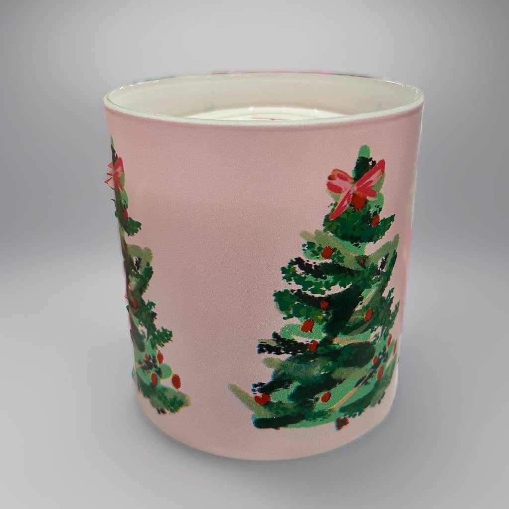 Pink Pine Candle with holiday tree design on pink background for festive gift decor
