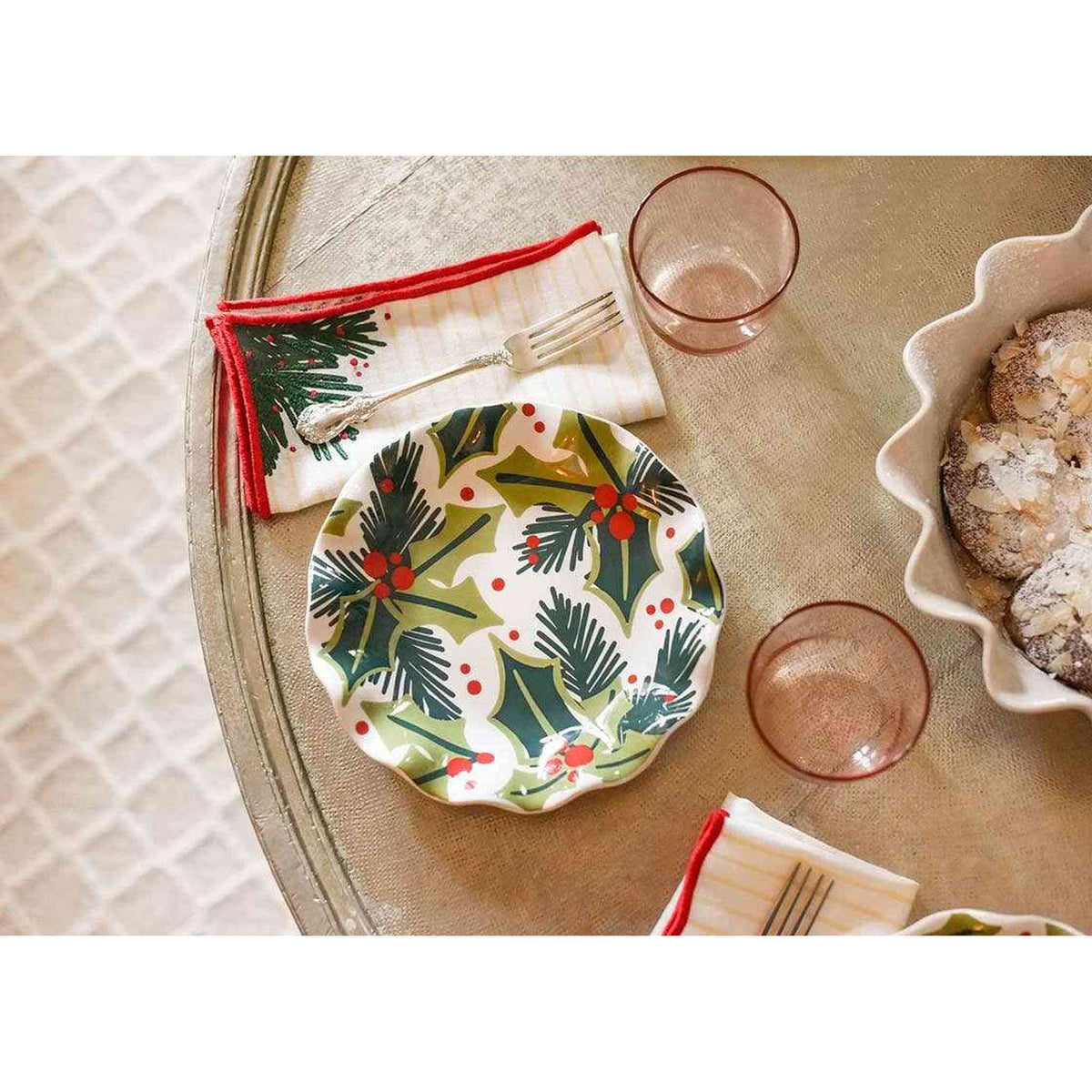 
                  
                    Holly Ruffle Salad Plate with festive holly and berry design and ruffled rim on holiday table setting
                  
                
