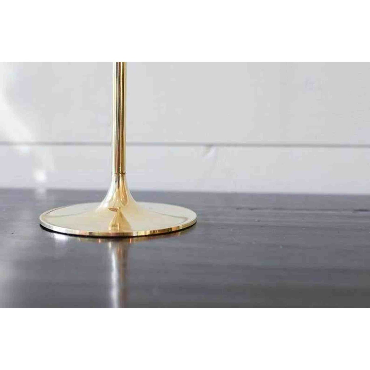 
                  
                    A set of three brass candlesticks. - Curated Home Decor
                  
                