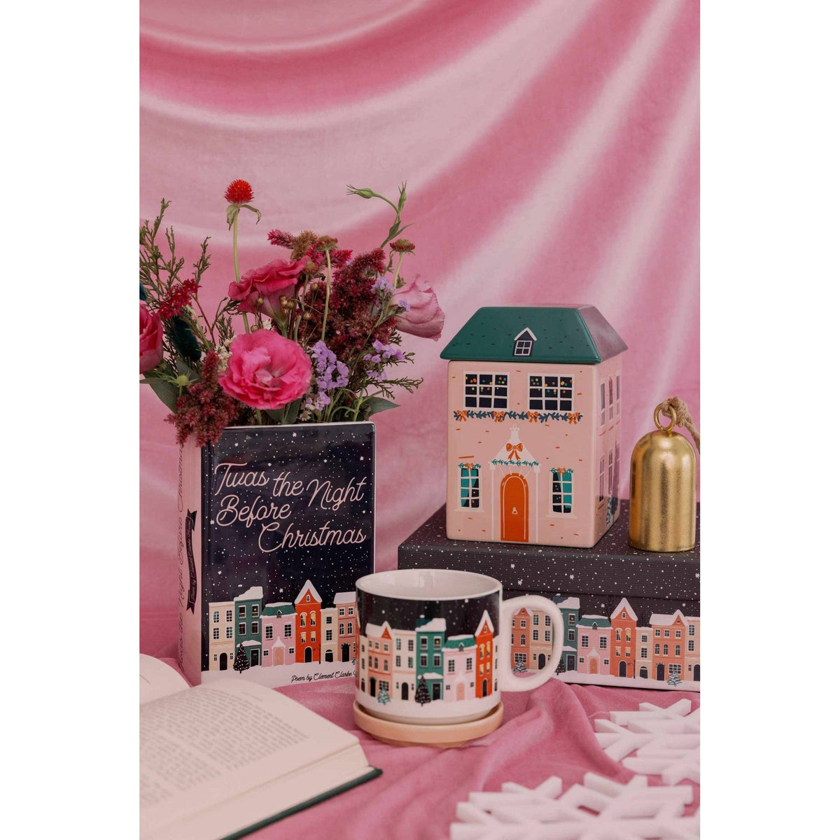 
                  
                    Ceramic holiday cottage cookie jar inspired by Twas the Night Before Christmas with festive details and removable roof lid
                  
                