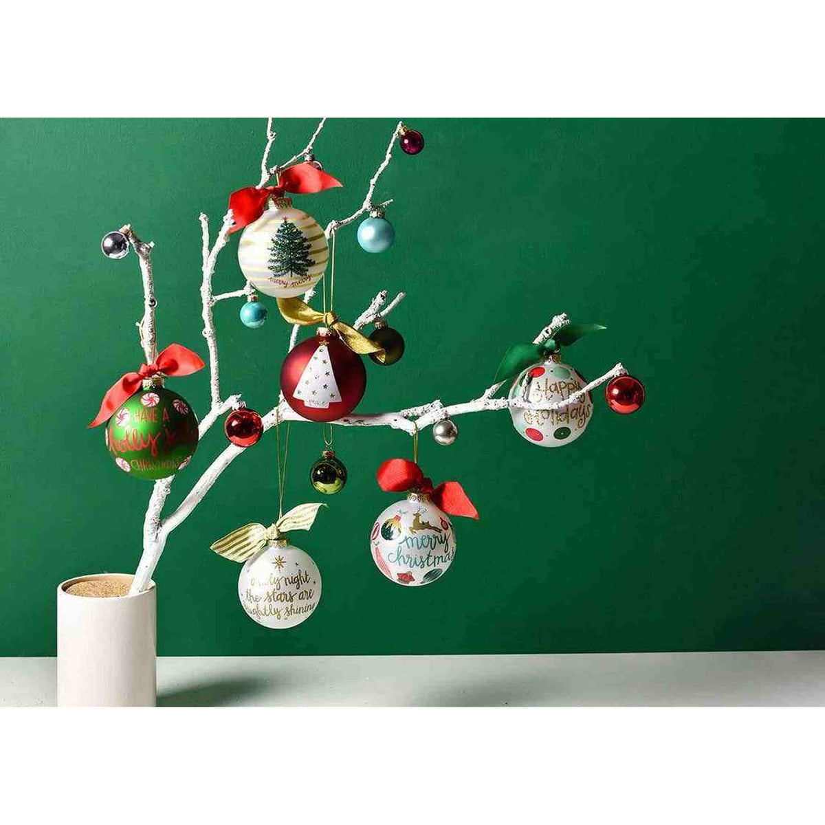 
                  
                    Stars Are Brightly Shining glass Christmas ornament with gold glitter and metallic script hanging on white branch display
                  
                