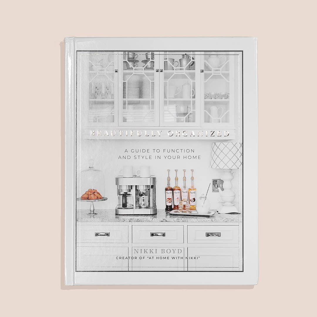Beautifully Organized (White Coffee Table Books) by Nikki Boyd offers style tips for a more organized home.