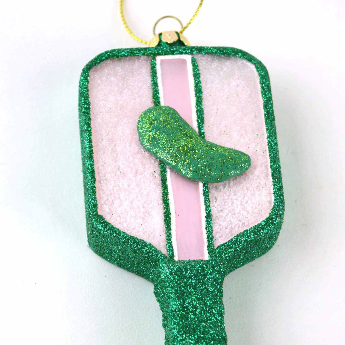 
                  
                    Hand-painted Pickleball boxed glass ornament with green glitter detail and hanging string
                  
                