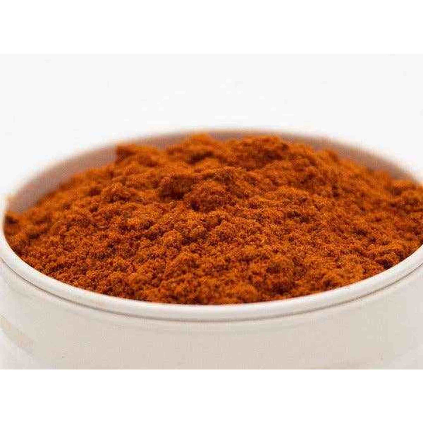 Close-up of smoked paprika powder in a white bowl, vibrant red color, 37g container, mild smoky chili seasoning