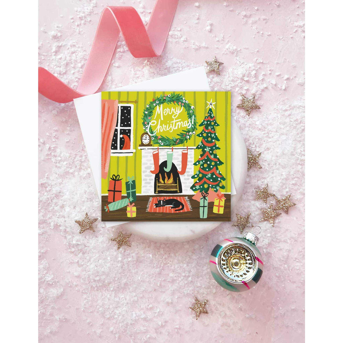 Festive Fireplace Card with colorful Christmas scene, wreath, tree, gifts, and stockings on matte eggshell stock