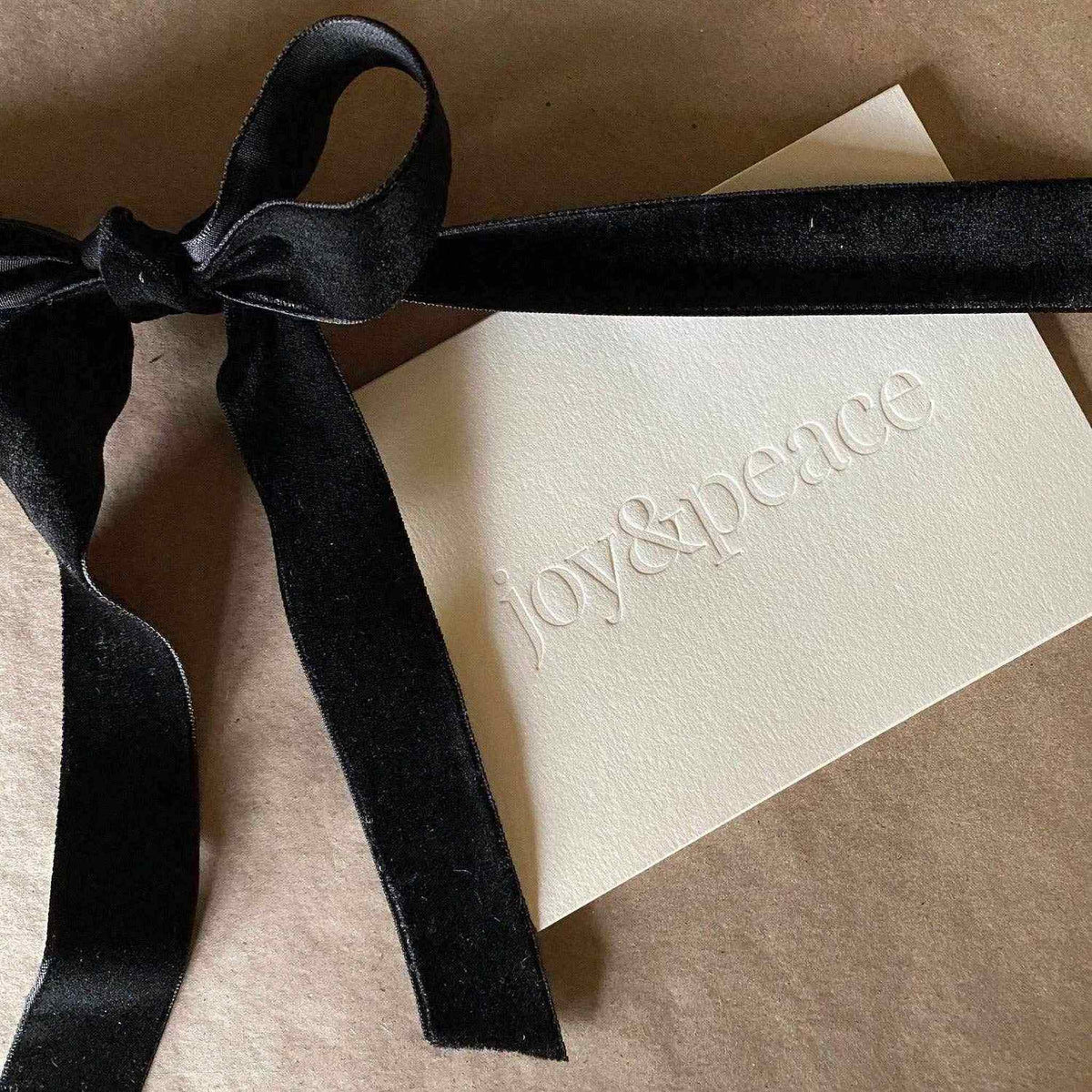 
                  
                    Joy & Peace No. 01 olive folded card with blind deboss and natural envelope
                  
                