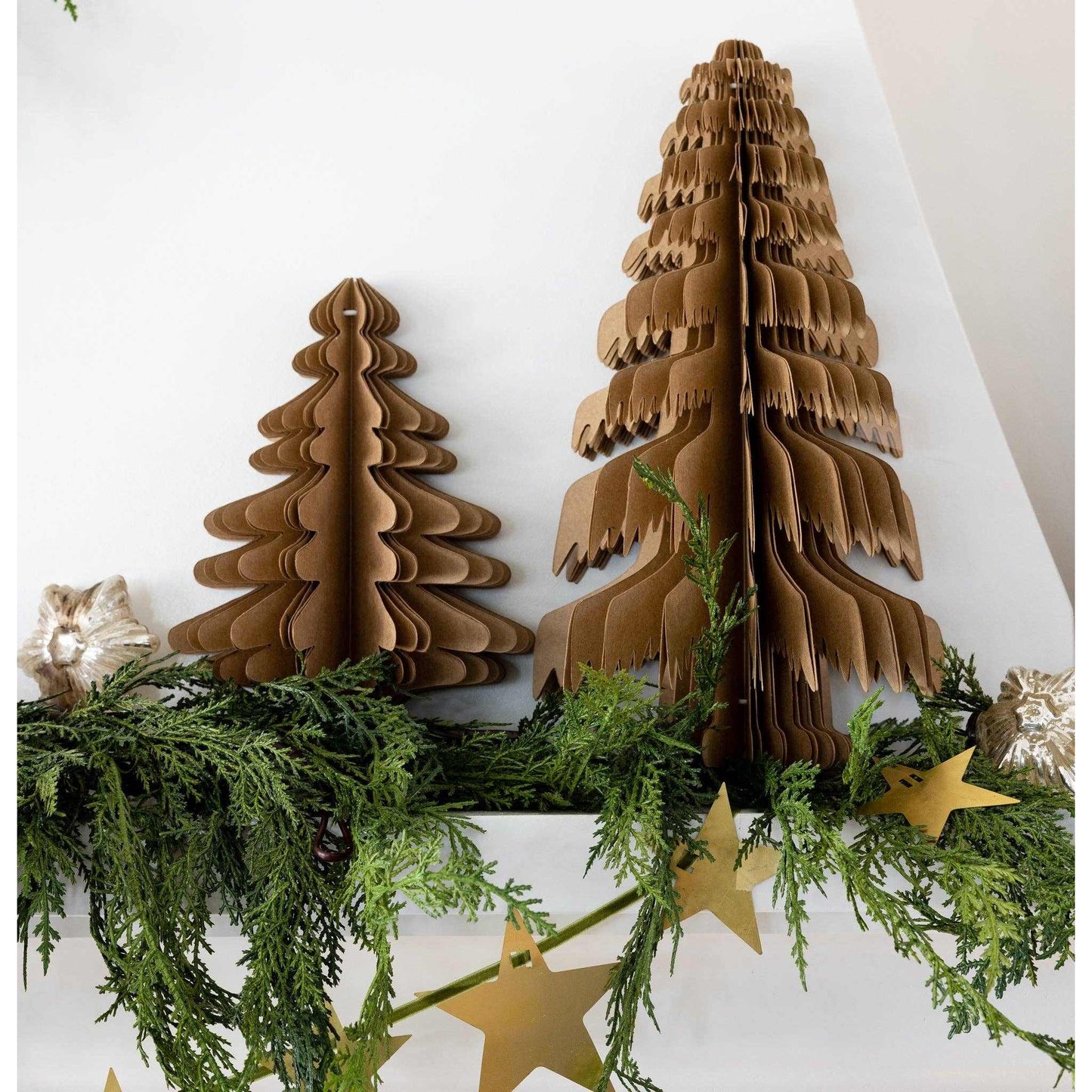 Christmas Memories medium kraft paper tree decor with green garland and gold star accents for festive holiday display