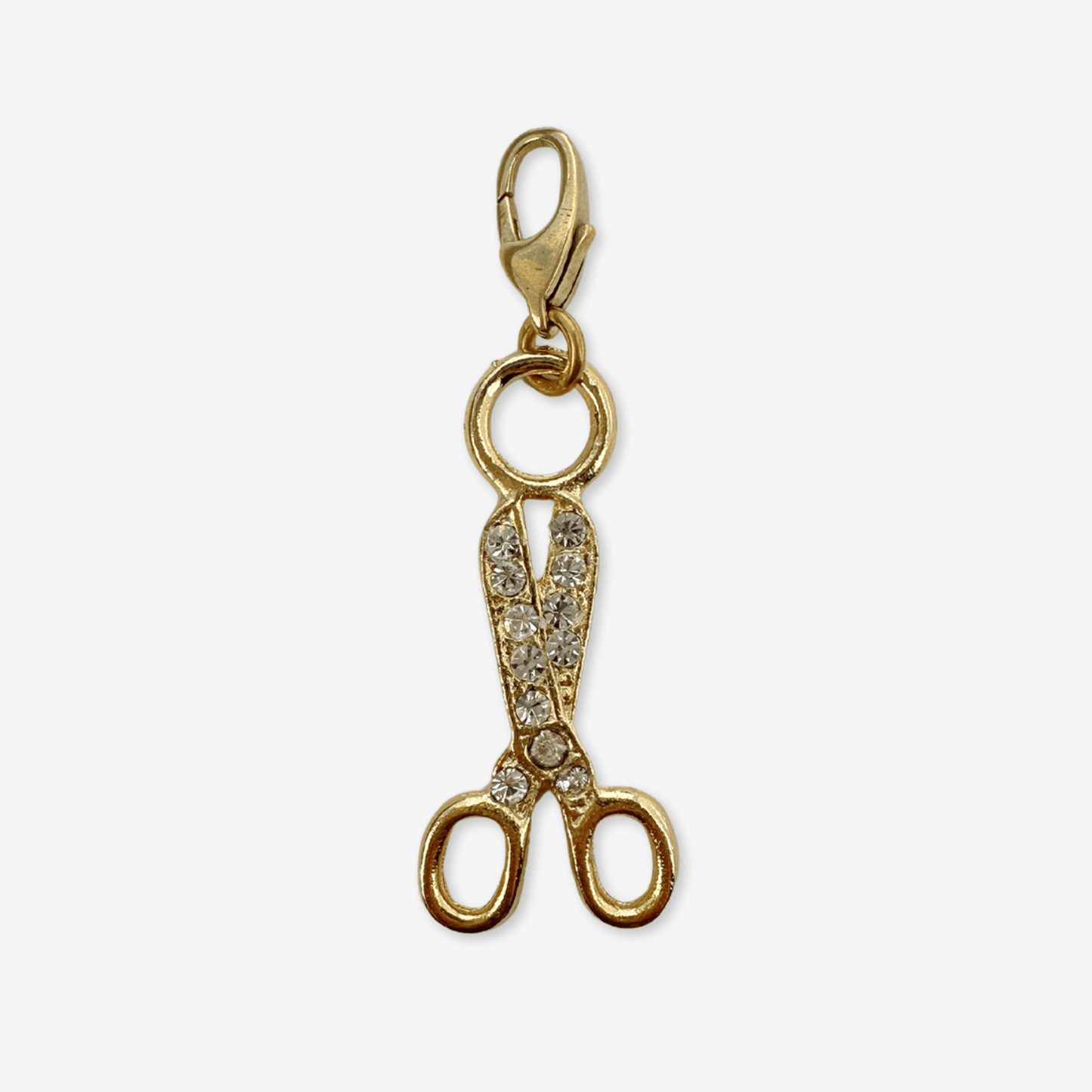 Vintage gold plated scissors charm with clear rhinestones and raw brass clasp