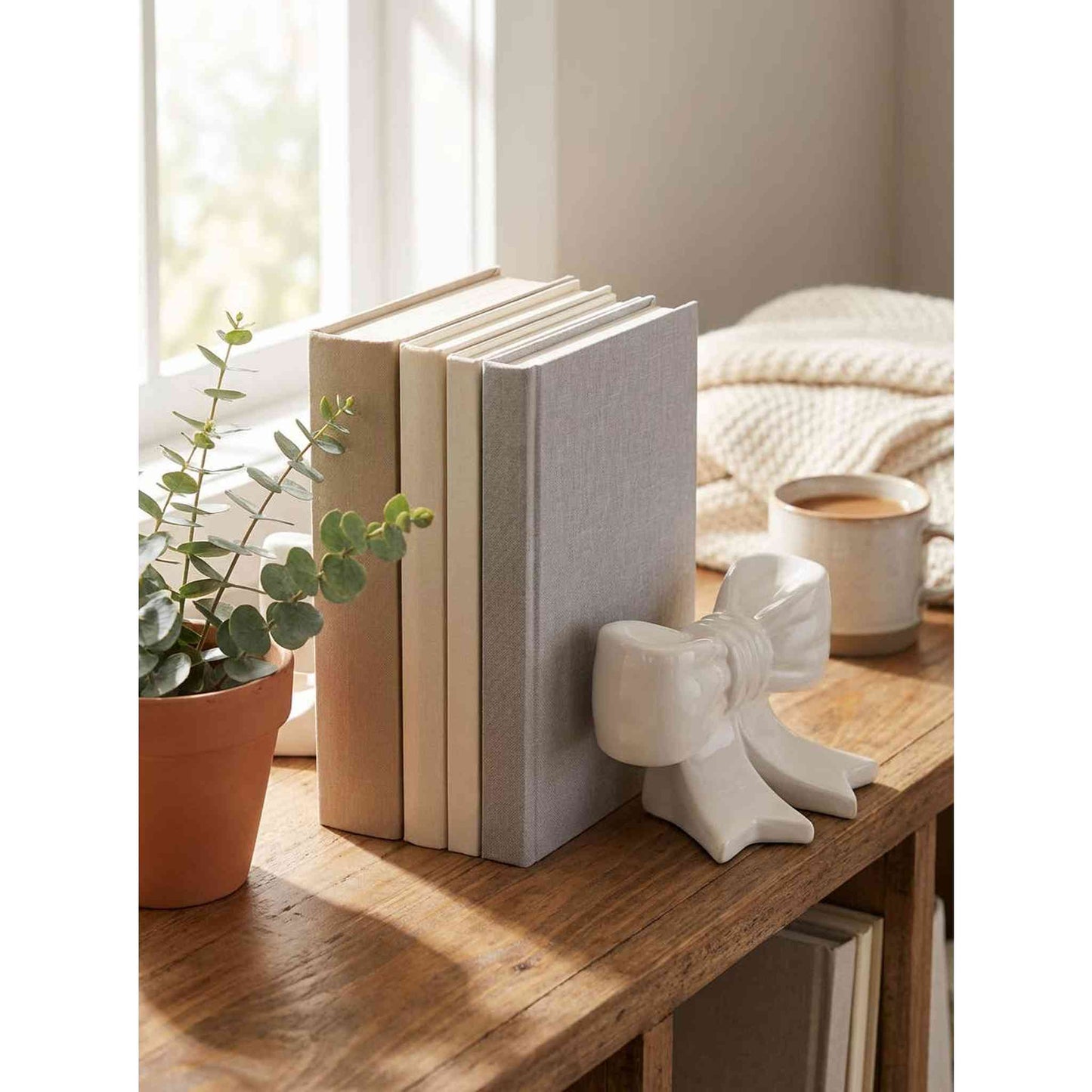 
                  
                    Single Ceramic Bow Bookend - Curated Home Decor
                  
                