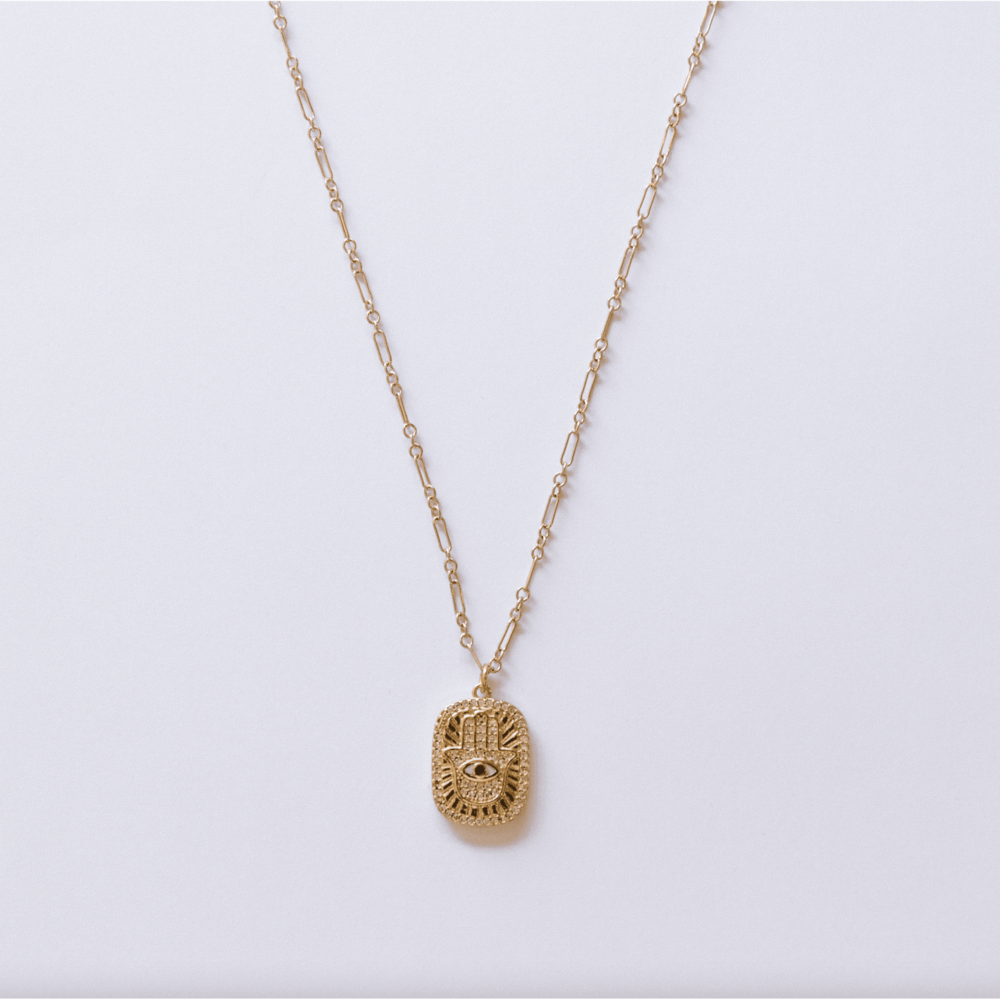 
                  
                    The Hamsa Evil Eye Tag Necklace - Curated Home Decor
                  
                