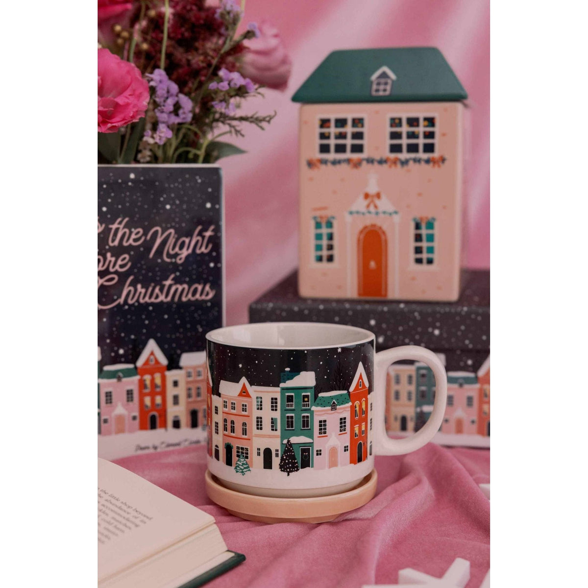 
                  
                    Ceramic cookie jar shaped like a cozy holiday cottage inspired by ’Twas the Night Before Christmas
                  
                