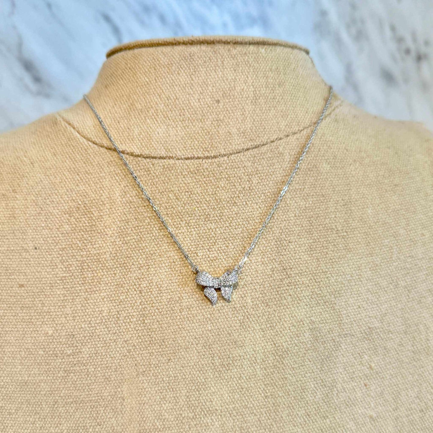 Elegant Classic Bow Necklace with timeless bow design and classic clasp accessory