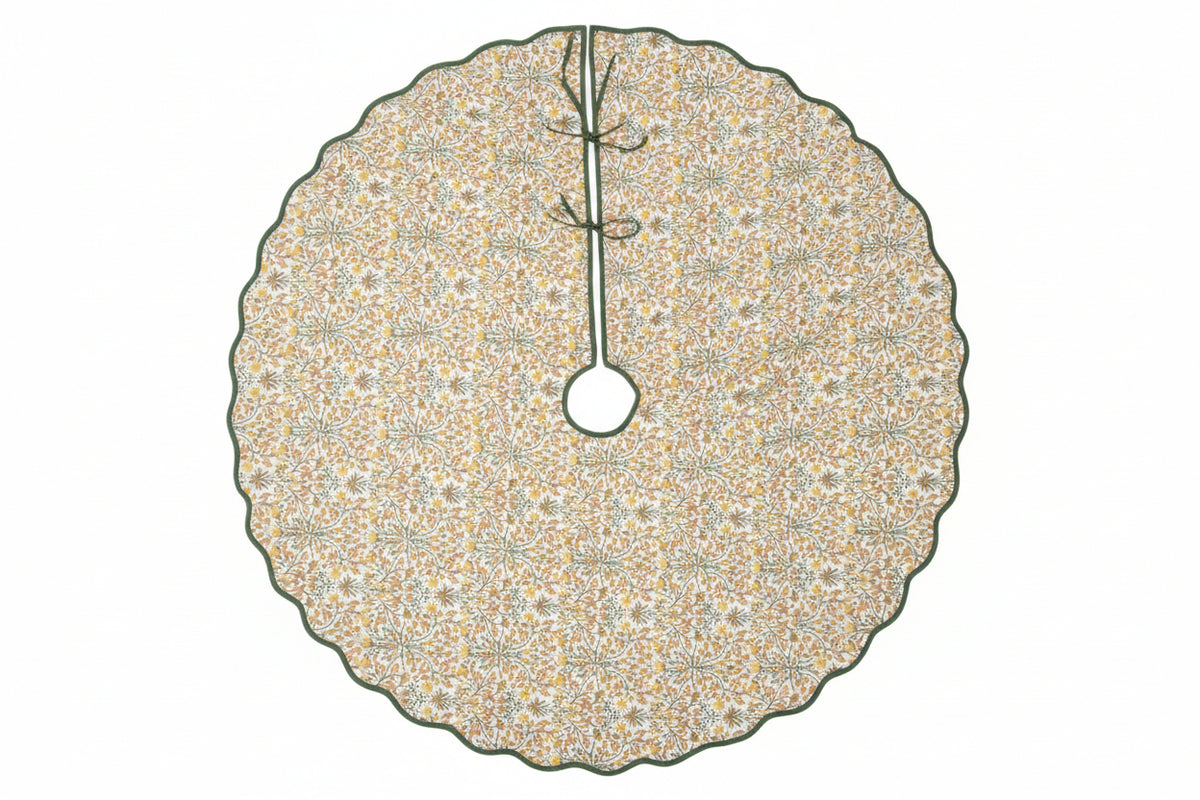 
                  
                    Goldenrod floral block print Christmas tree skirt with green scalloped trim
                  
                