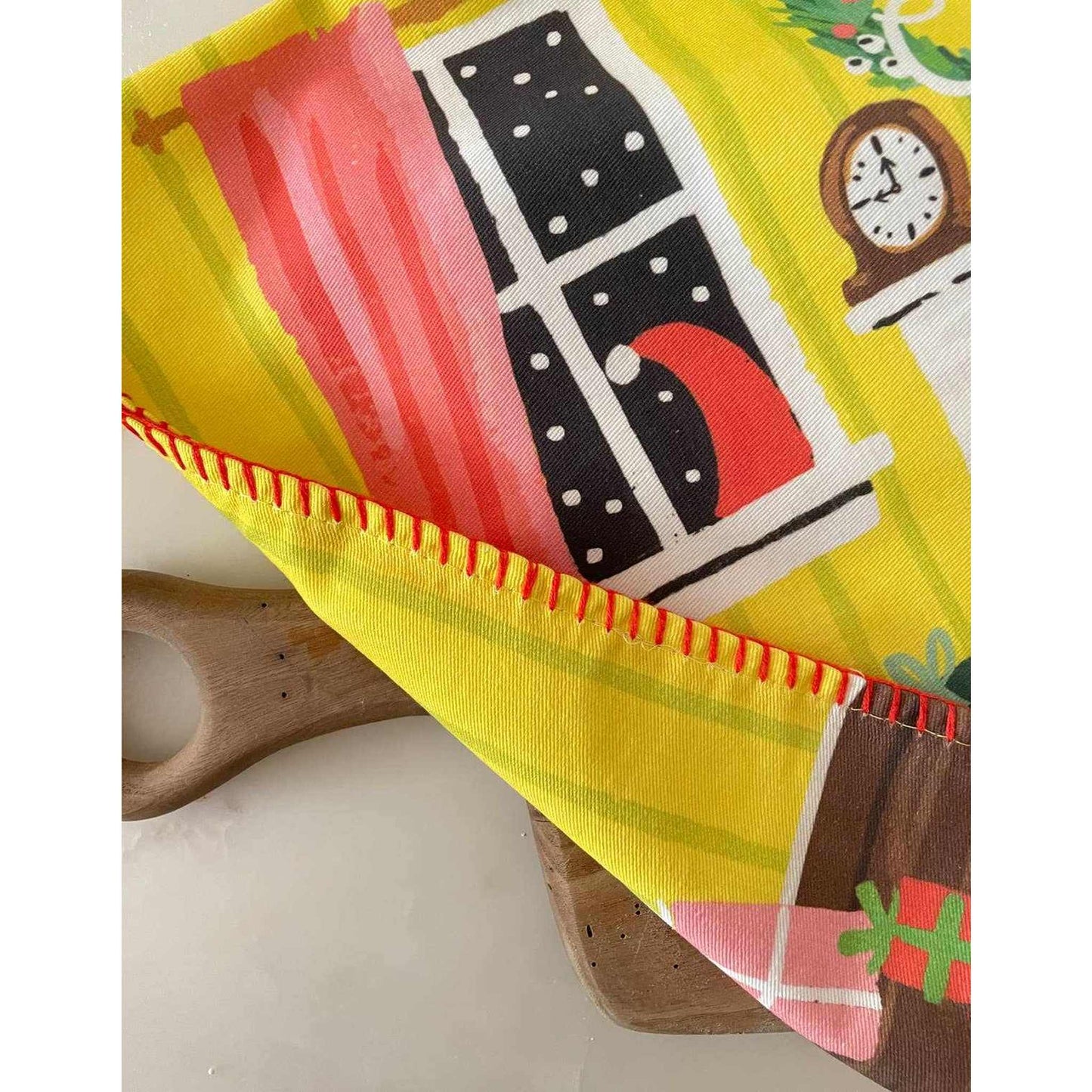 Festive Fireplace Tea Towel with bright embroidery and colorful holiday design on absorbent cotton