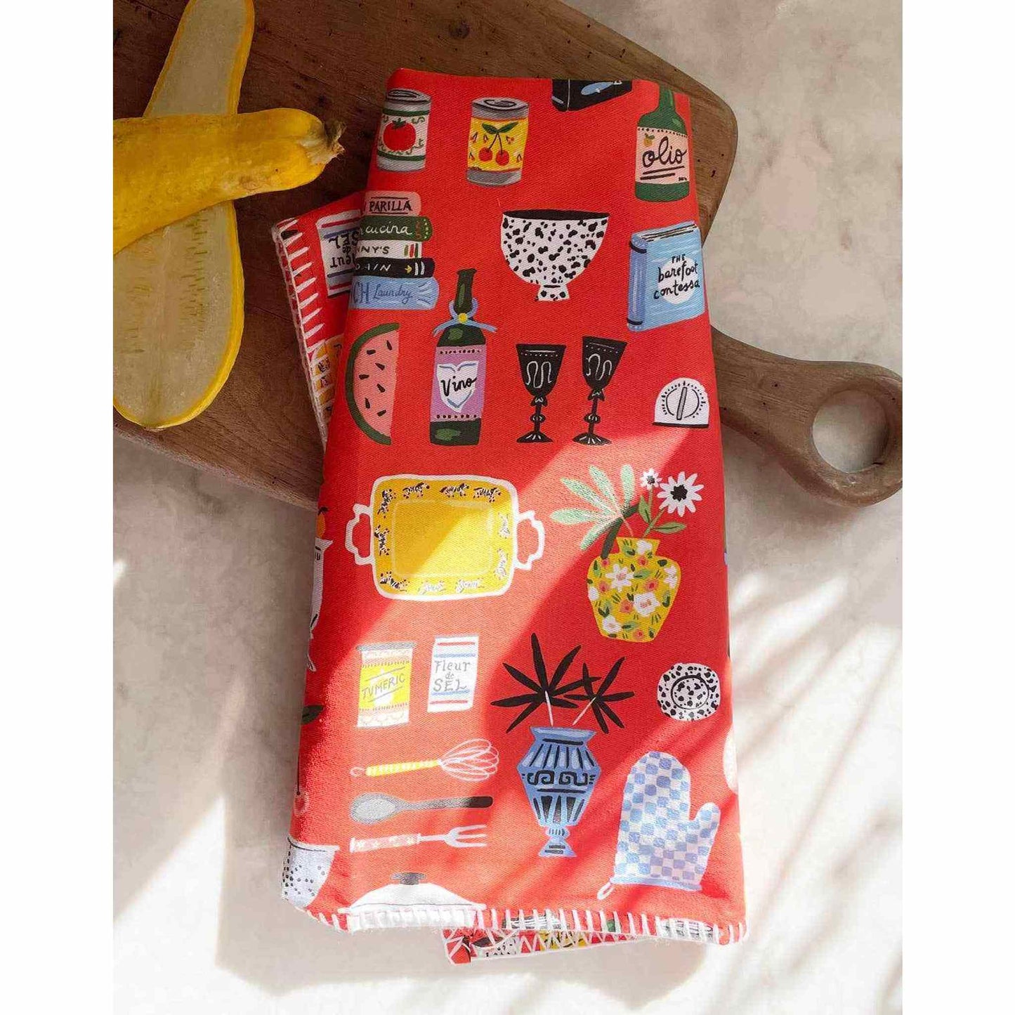 Red Kitchen Shelf Tea Towel with colorful kitchen-themed prints and embroidered trim