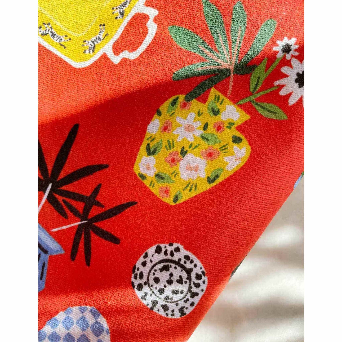 Colorful Kitchen Shelf Tea Towel with hand-painted designs and embroidered trim on absorbent cotton fabric