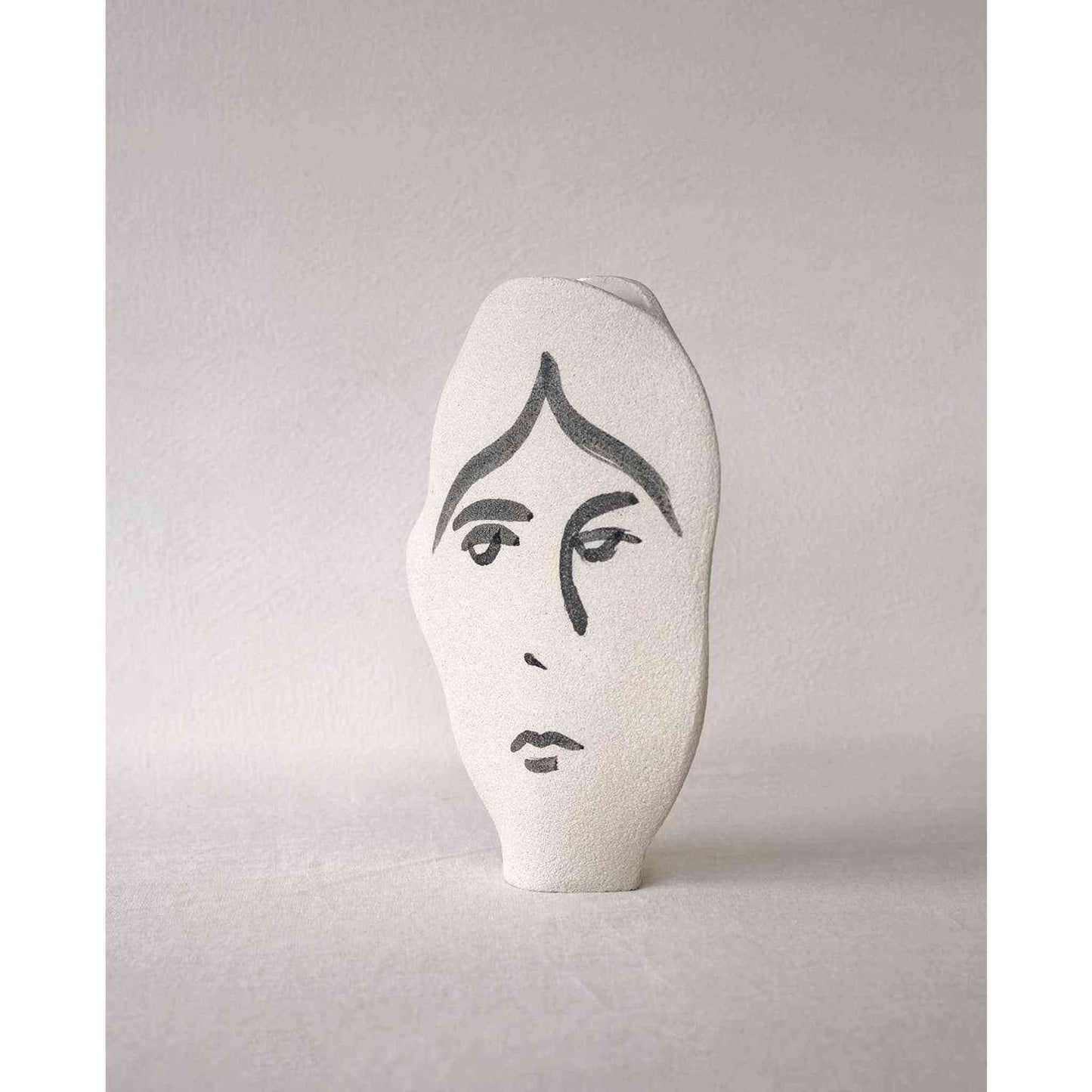 
                  
                    Handmade Ceramic Summer Vase 'Frida N°2' with hand-painted face motif and textured raw clay exterior
                  
                