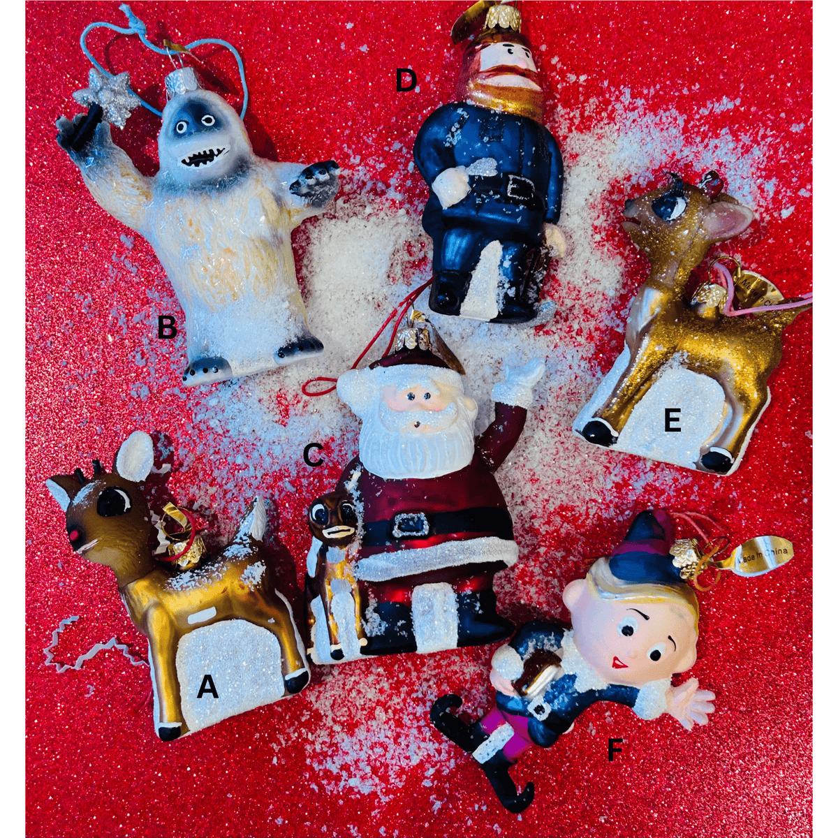 
                  
                    Retro Rudolph Ornaments featuring vintage-style Rudolph, Santa, Hermey the Elf, Hugo the Abominable Snowman, Yukon Cornelius, and Clarence holiday decorations
                  
                