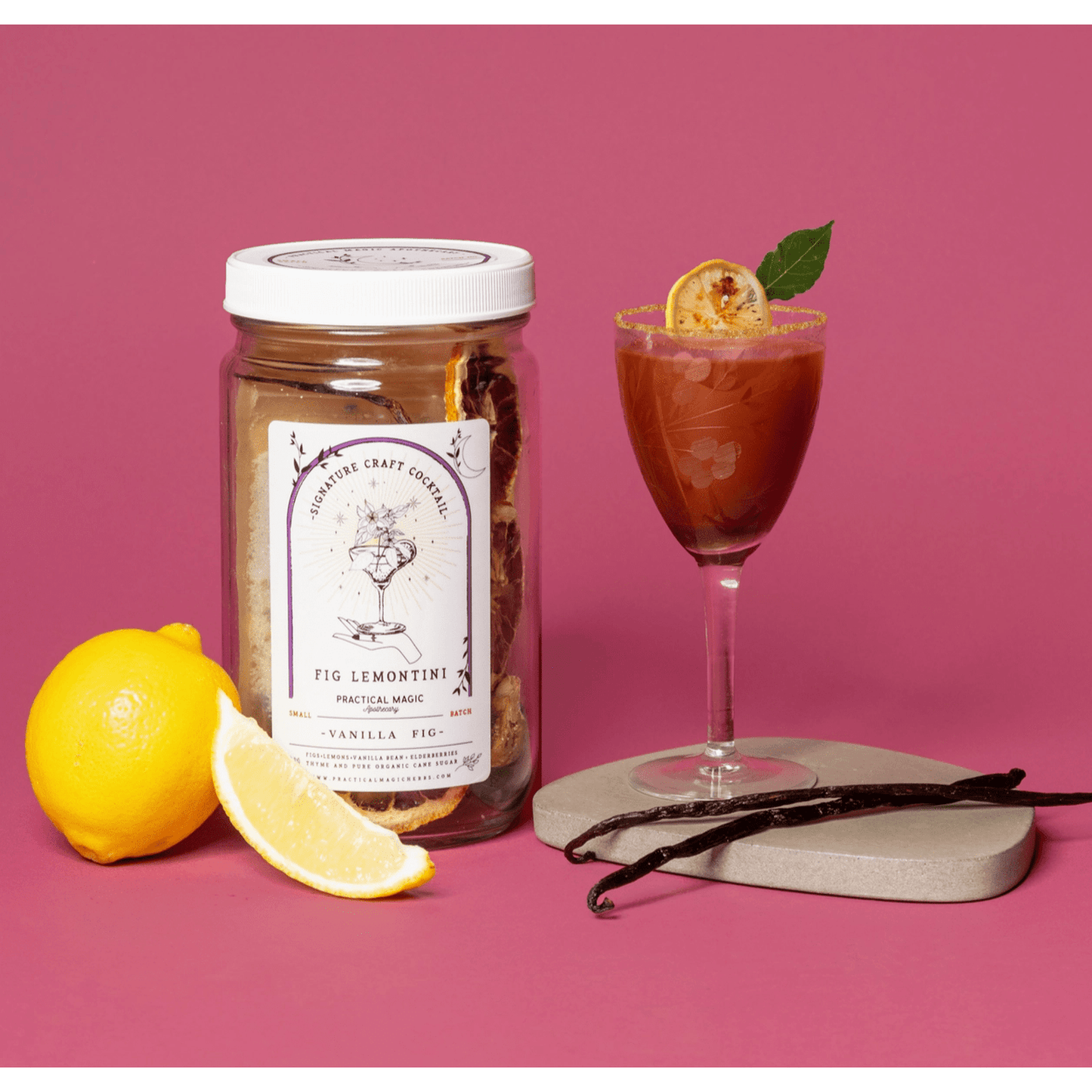 Botanical Craft Cocktail Fig Lemontini with vanilla, fig, lemon, thyme ingredients and garnished martini glass