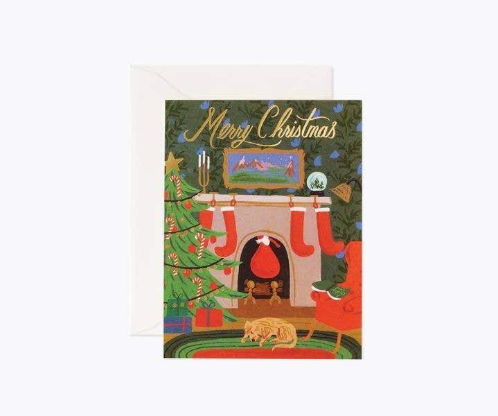 Christmas Eve Scene Card with festive fireplace, Christmas tree, stockings, and metallic gold foil "Merry Christmas" text, blank interior holiday greeting card