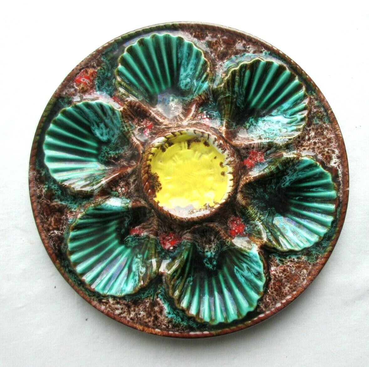 Vintage French majolica oyster plate, Vallauris, six green shells around a yellow center well