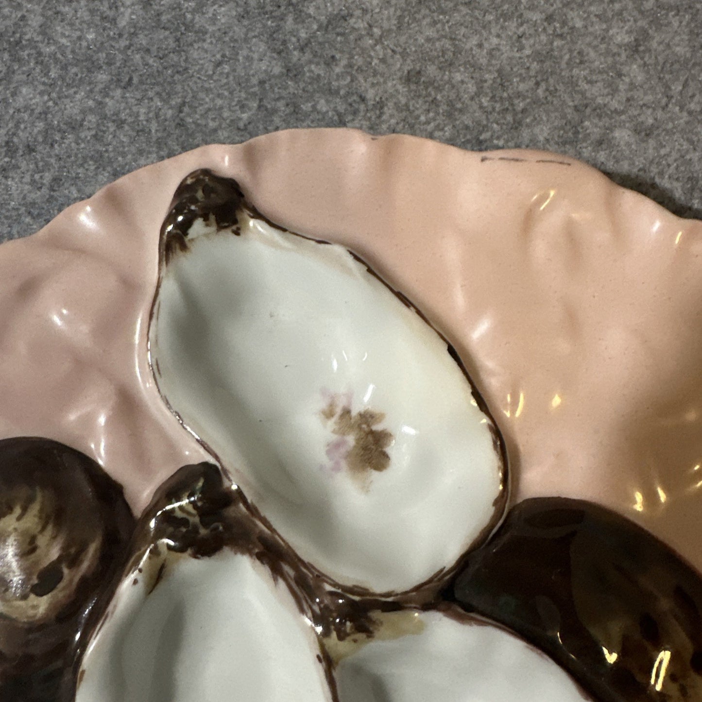 
                  
                    Haviland Limoges oyster plate angle view
                  
                
