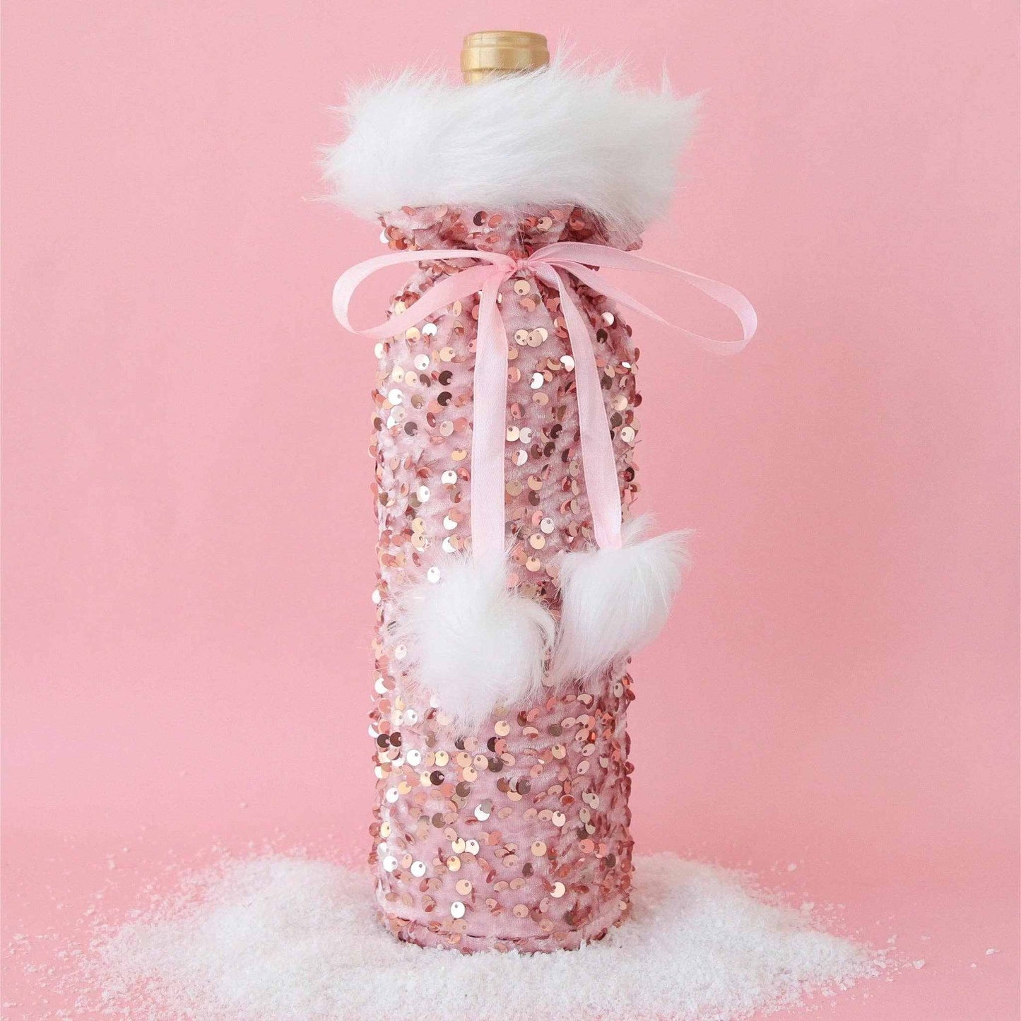 Pink holiday sequin wine bag with white faux fur trim and pom pom bow for standard thin bottles