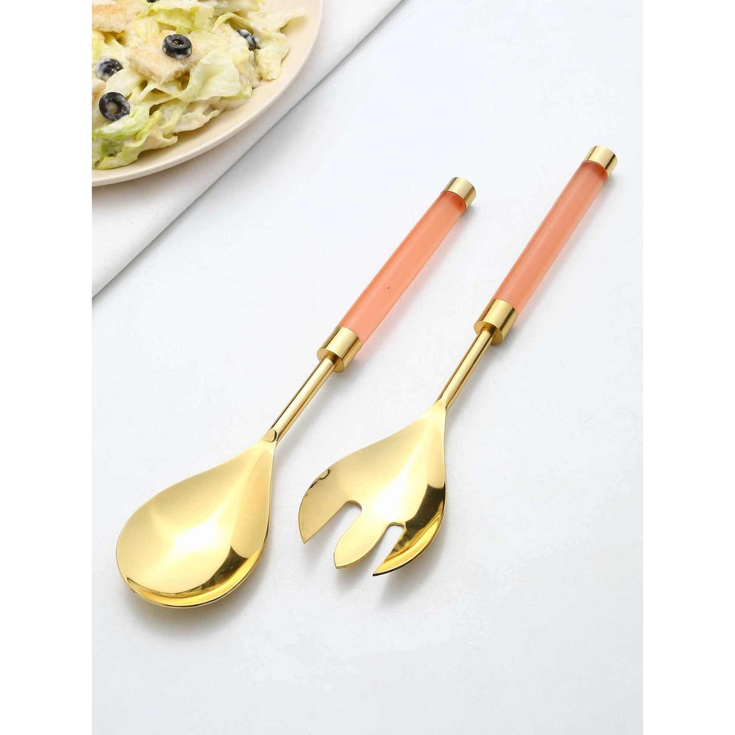 Gold and resin salad server set with goldtone bowls and translucent resin handles